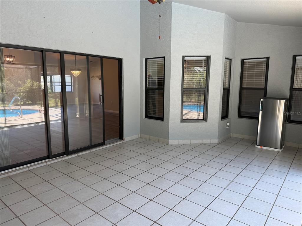 994 East Crown Of Roses Loop Inverness, FL 34453 - Photo 17 of 20 a view of an empty room and window