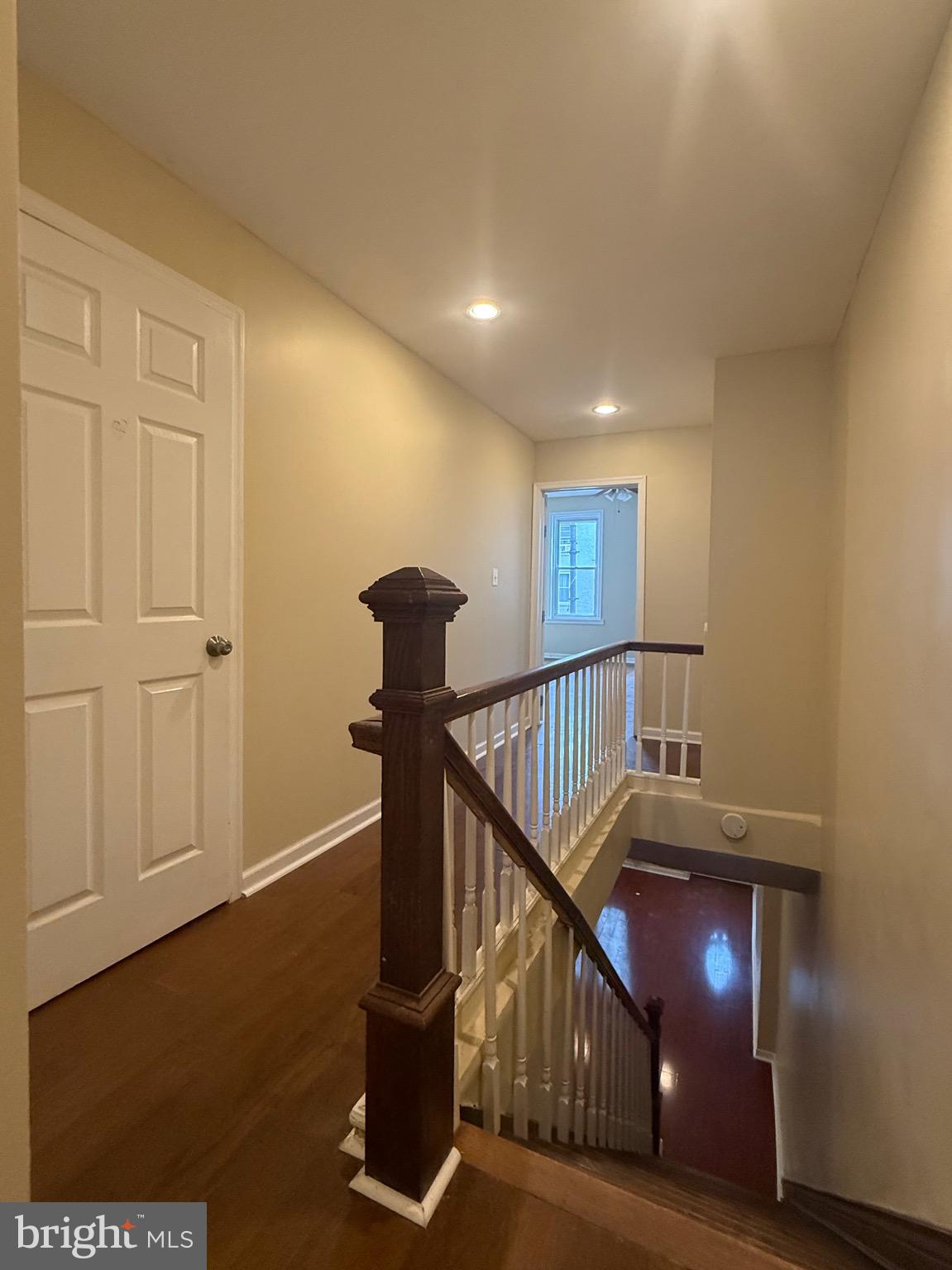 2512 North Front Street Philadelphia, PA 19133 - Photo 18 of 33 a view of a hallway with wooden floor and staircase