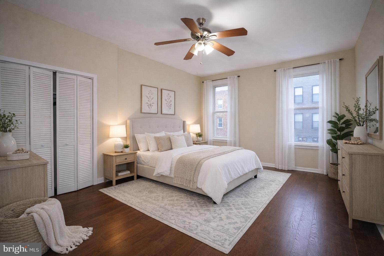 2512 North Front Street Philadelphia, PA 19133 - Photo 3 of 33 a bedroom with a bed and a chandelier