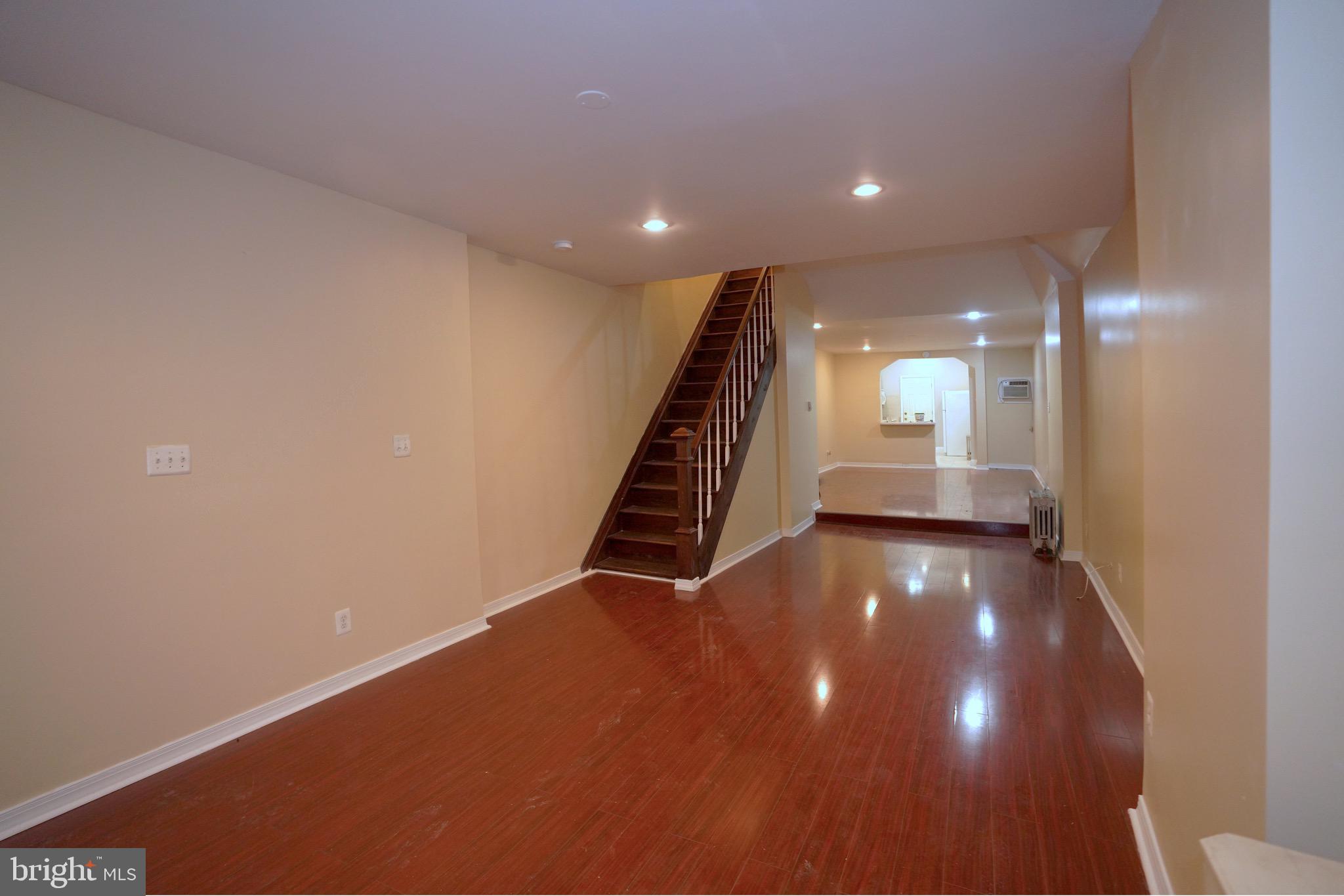 2512 North Front Street Philadelphia, PA 19133 - Photo 6 of 33 a view of an empty room with wooden floor