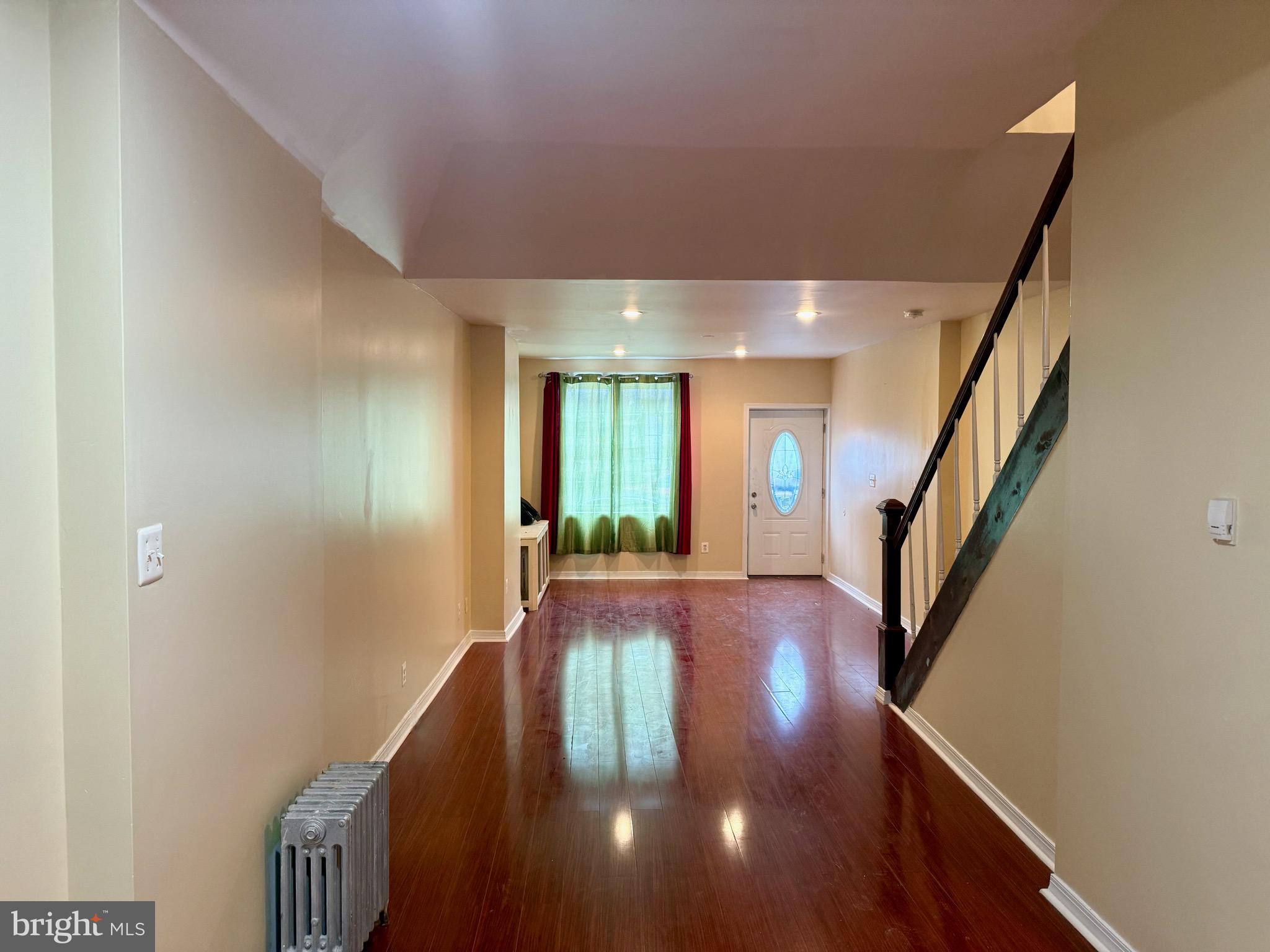 2512 North Front Street Philadelphia, PA 19133 - Photo 8 of 33 a view of entryway and hall with wooden floor