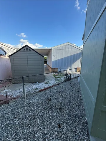 a house view with a backyard space