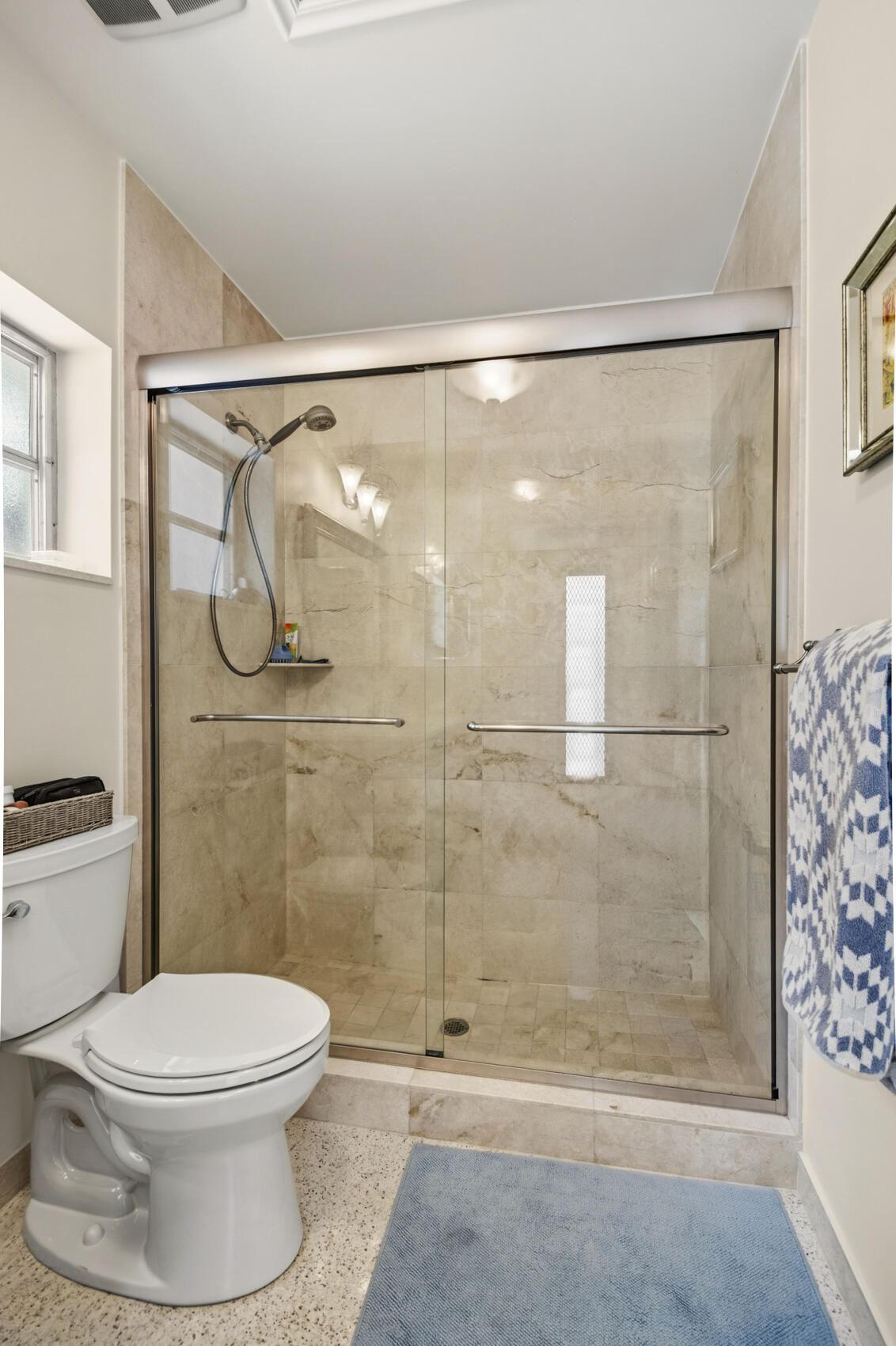 1348 Southwest 4th Street Boca Raton, FL 33486 - Photo 18 of 44 a bathroom with a shower a toilet and a shower