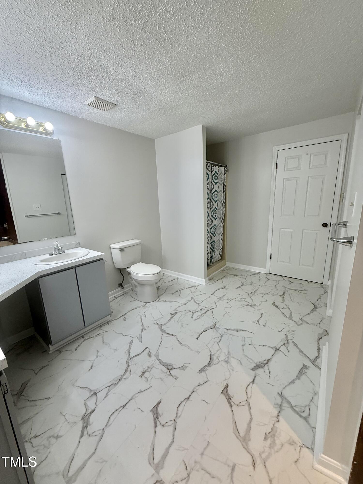 192 Misty Hollow Road Timberlake, NC 27583 - Photo 24 of 43 a view of a room with a sink