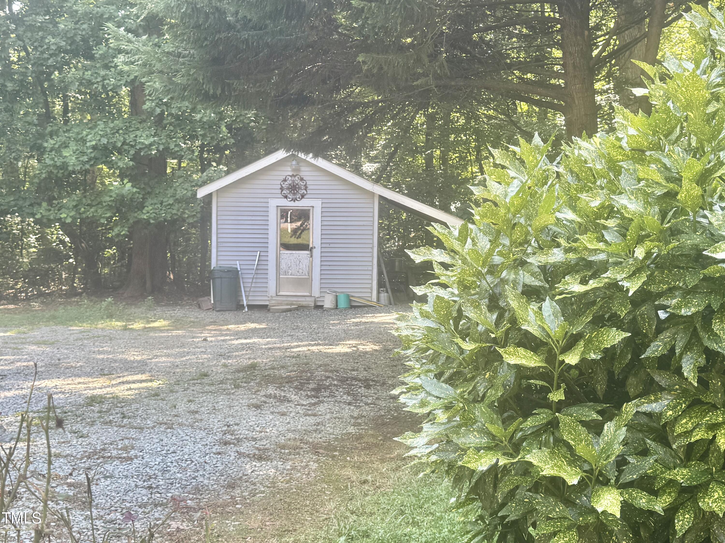 192 Misty Hollow Road Timberlake, NC 27583 - Photo 36 of 43 a house with a yard