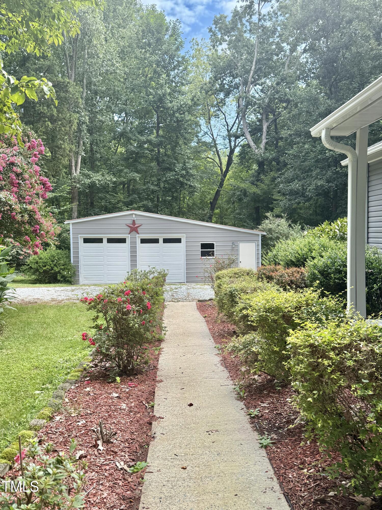 192 Misty Hollow Road Timberlake, NC 27583 - Photo 40 of 43 a view of a back yard of the house