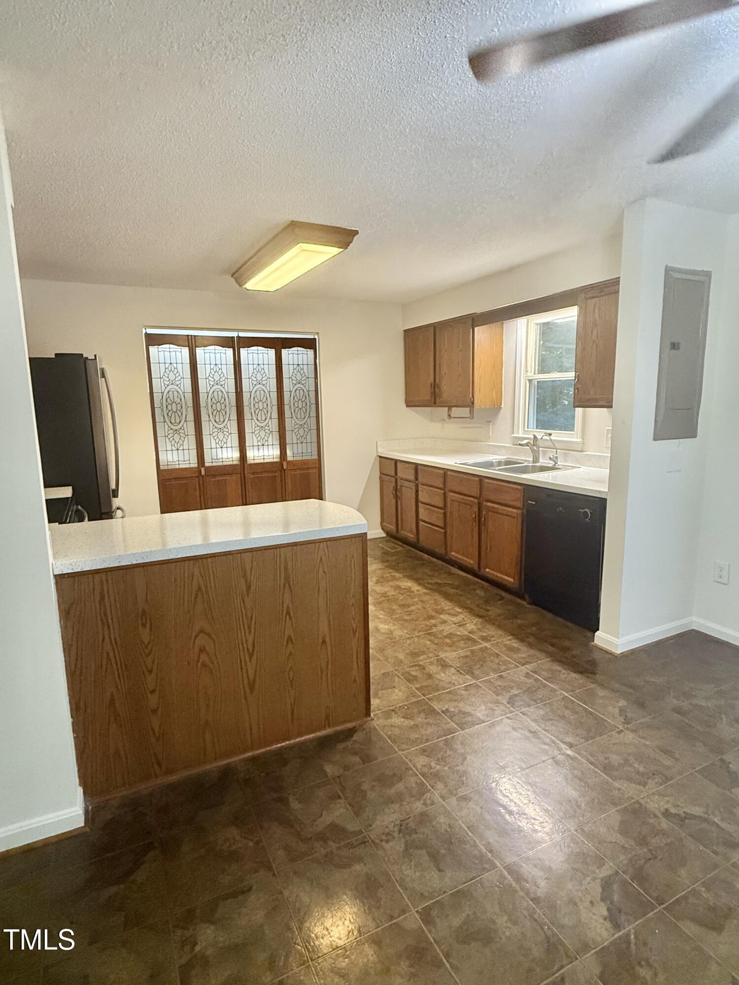 192 Misty Hollow Road Timberlake, NC 27583 - Photo 8 of 43 a view of a kitchen with large window