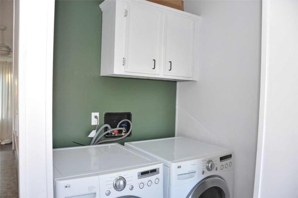 367 Mesquite Street Bertram, TX 78605 - Photo 11 of 23 a utility room with dryer and washer