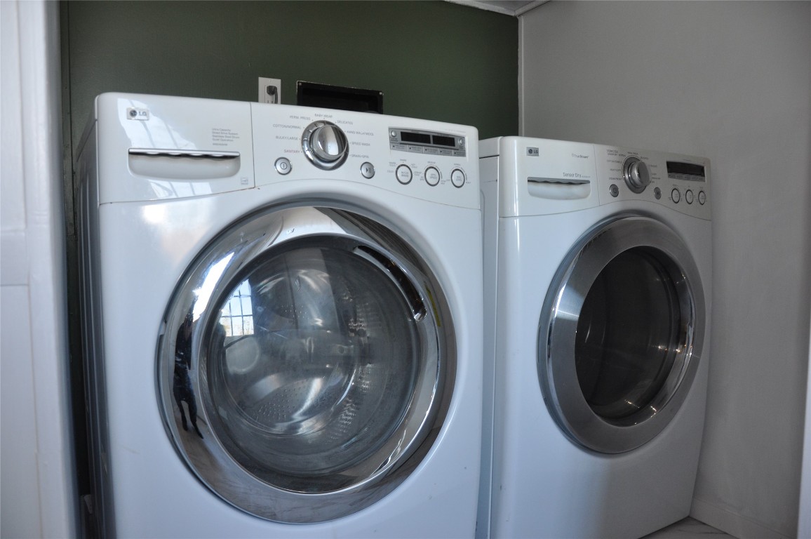 367 Mesquite Street Bertram, TX 78605 - Photo 10 of 23 a utility room with dryer and washer