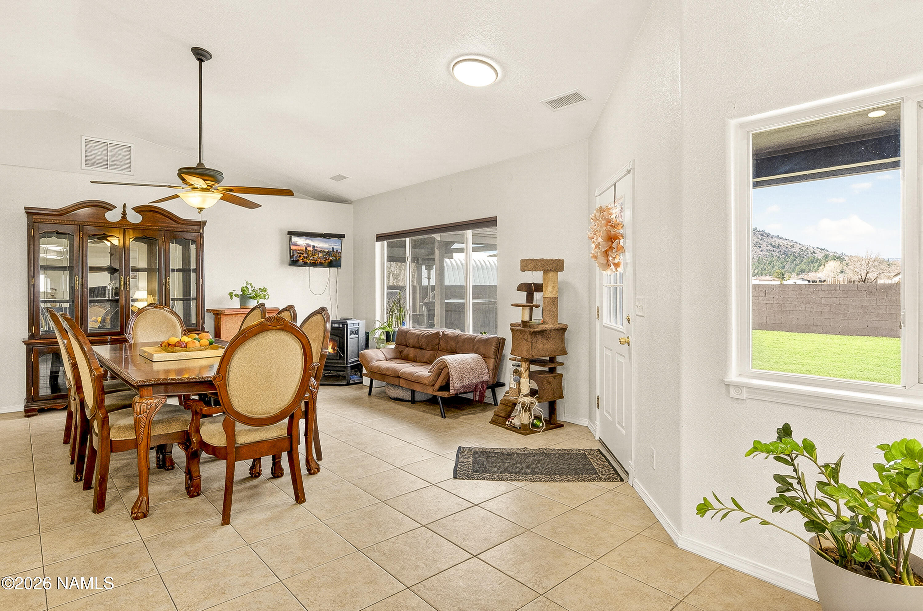 7725 Alma Road Flagstaff, AZ 86004 - Photo 11 of 38 a very nice looking room with a large window and furniture