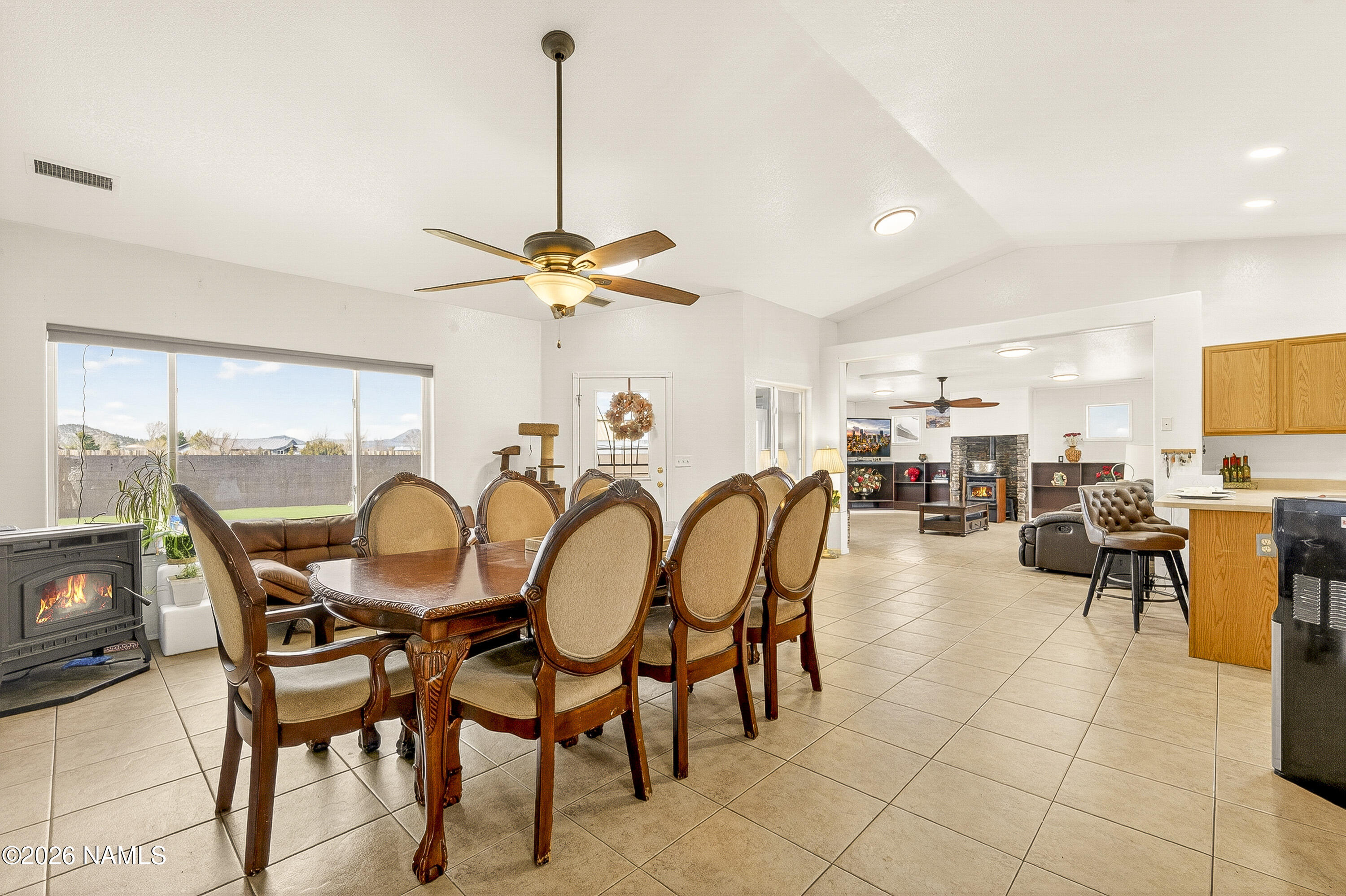 7725 Alma Road Flagstaff, AZ 86004 - Photo 12 of 38 a dining room with furniture and view of kitchen