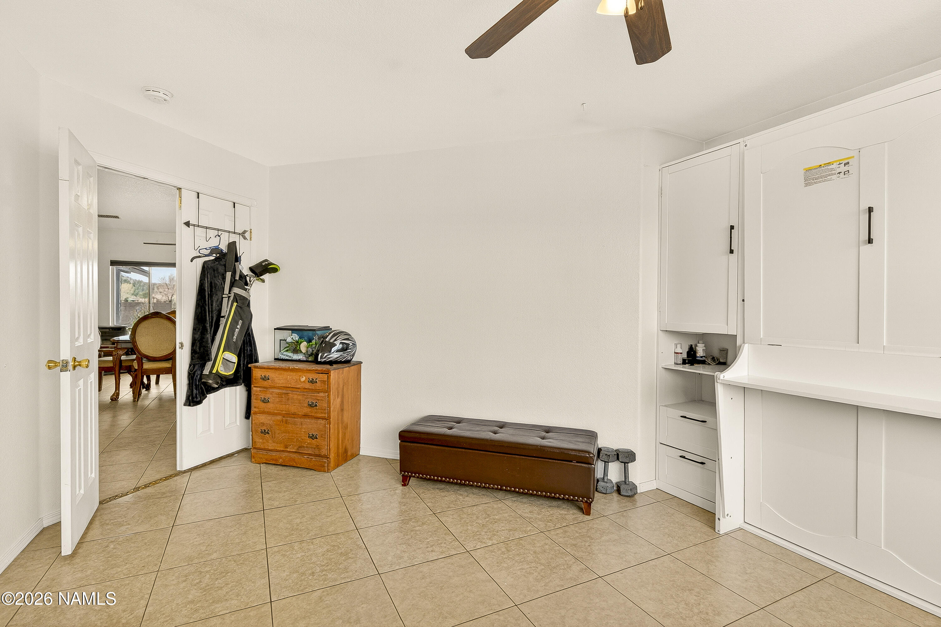7725 Alma Road Flagstaff, AZ 86004 - Photo 21 of 38 a room with gym equipment
