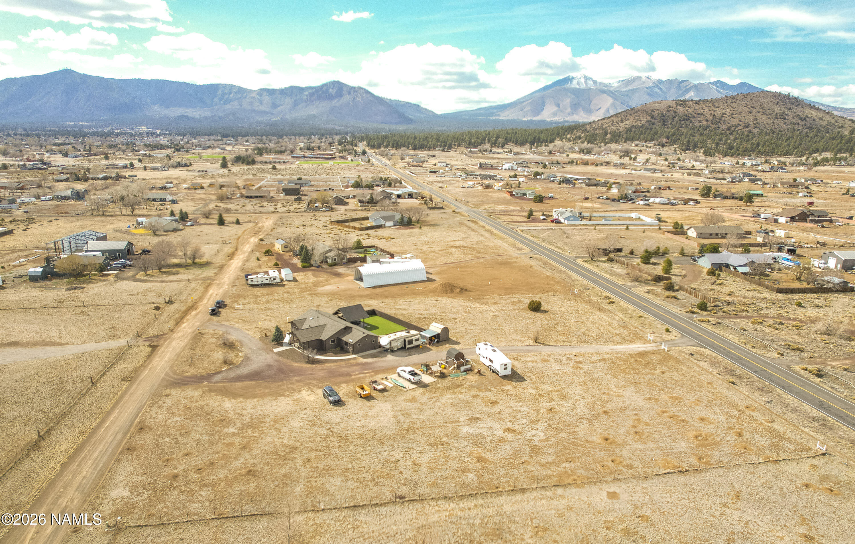 7725 Alma Road Flagstaff, AZ 86004 - Photo 35 of 38 a view of a sky from a terrace