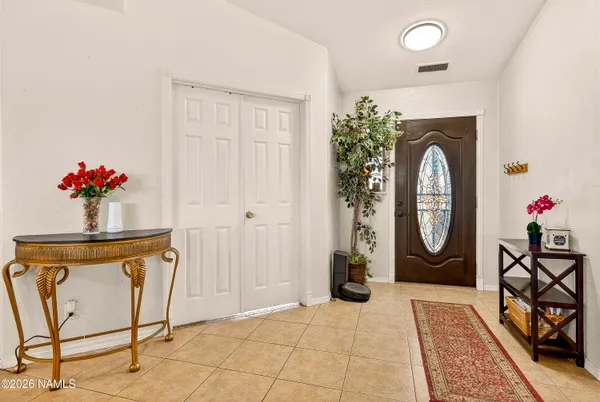 a view of a entryway door front of a house