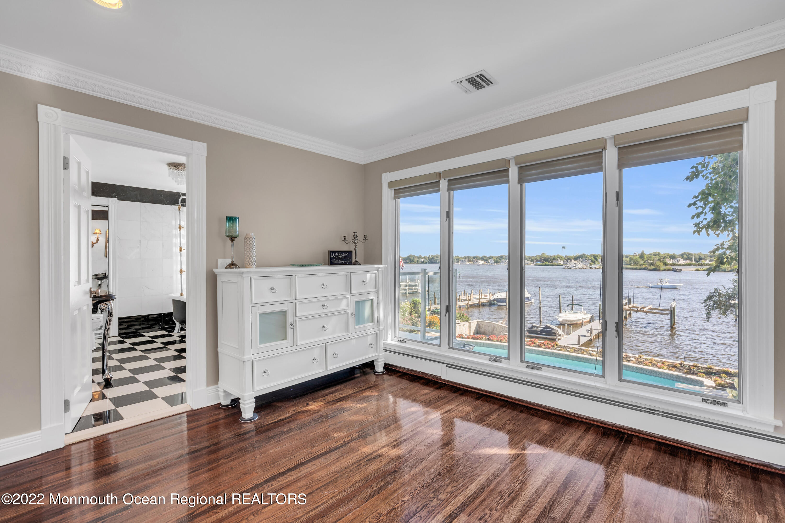 18 Brooks Road Toms River, NJ 08753 - Photo 22 of 53 a view of a bedroom with wooden floor and windows
