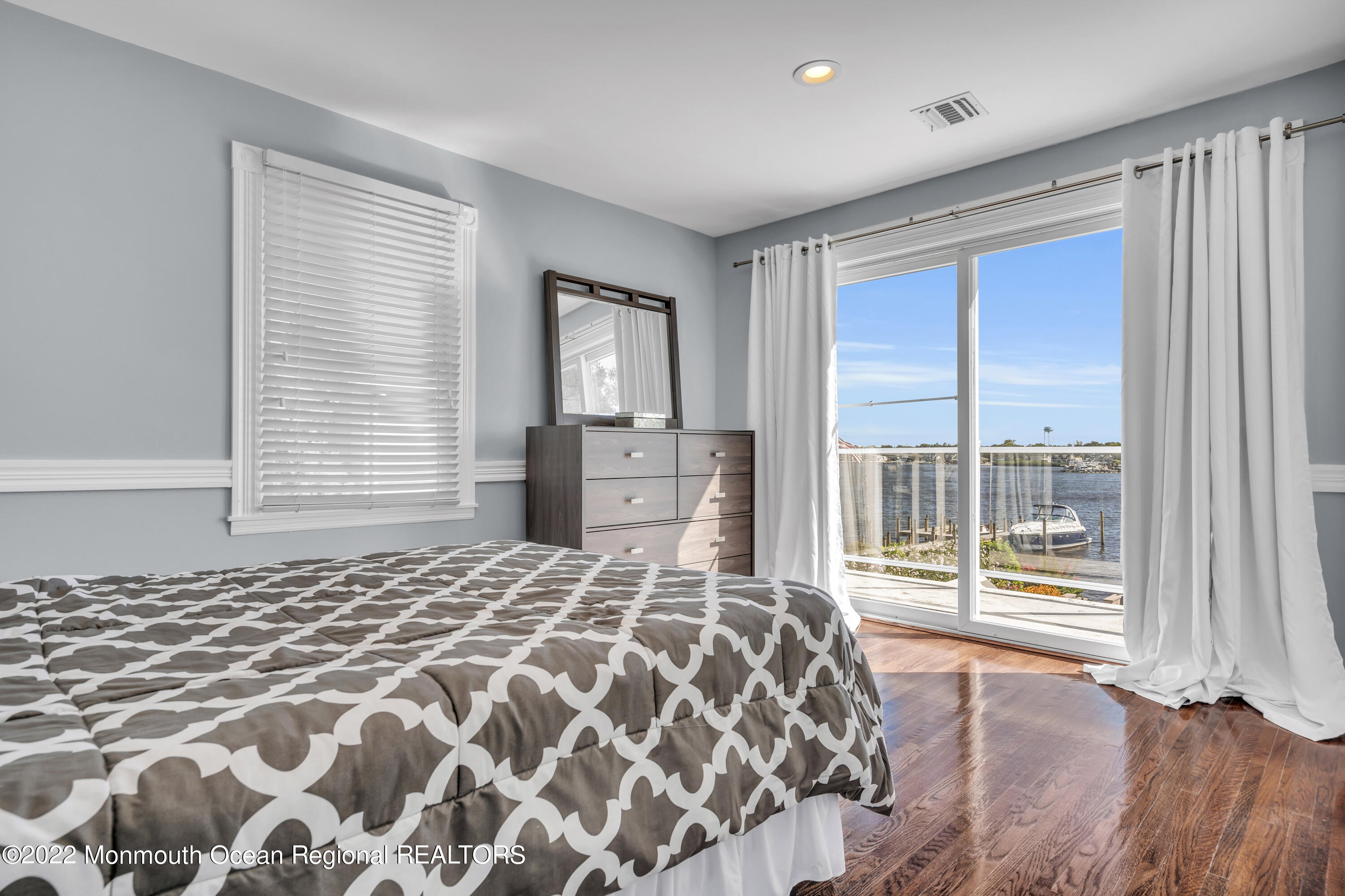 18 Brooks Road Toms River, NJ 08753 - Photo 25 of 53 a bedroom with a large bed and a large window