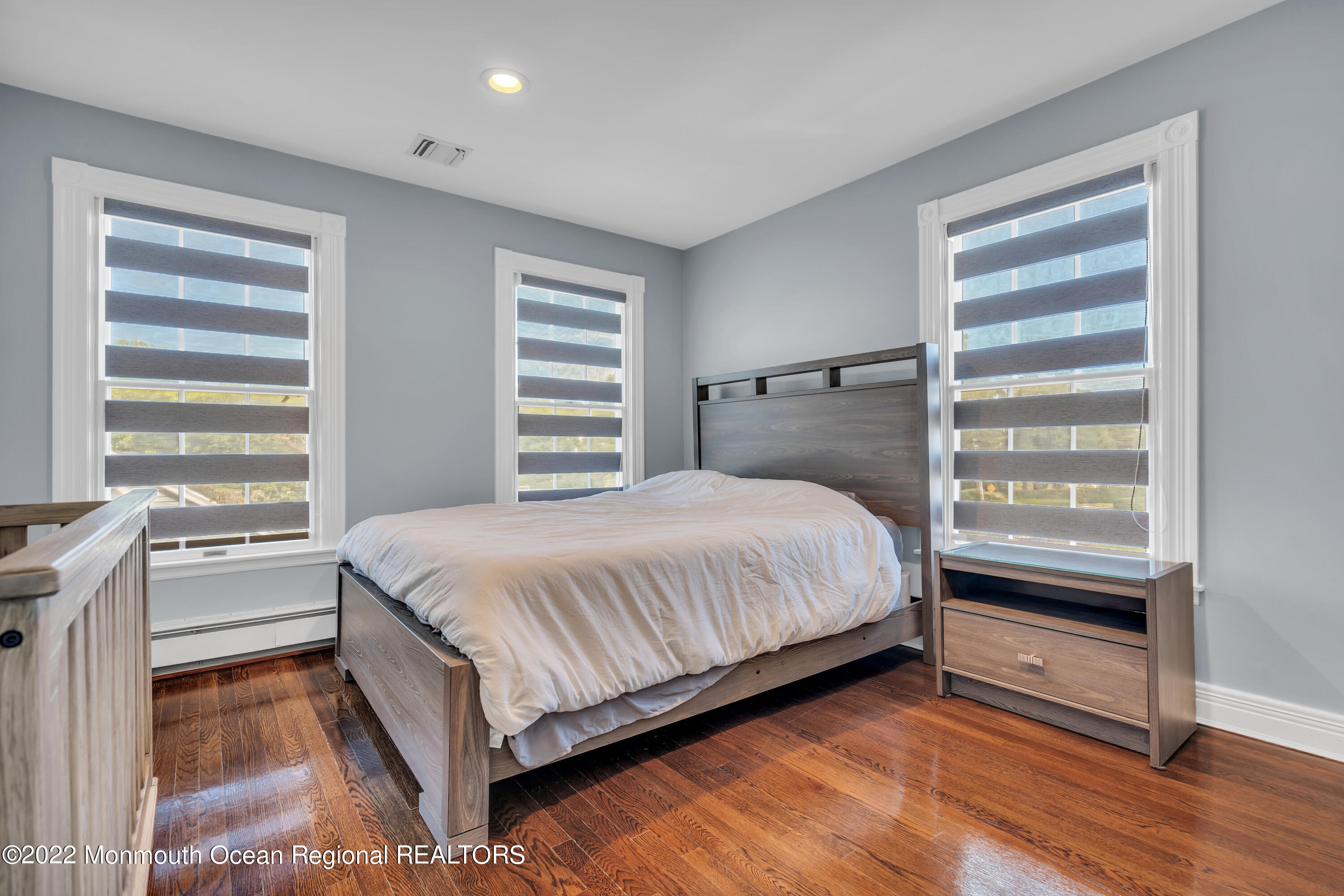 18 Brooks Road Toms River, NJ 08753 - Photo 27 of 53 a large bed sitting in a bedroom next to a window