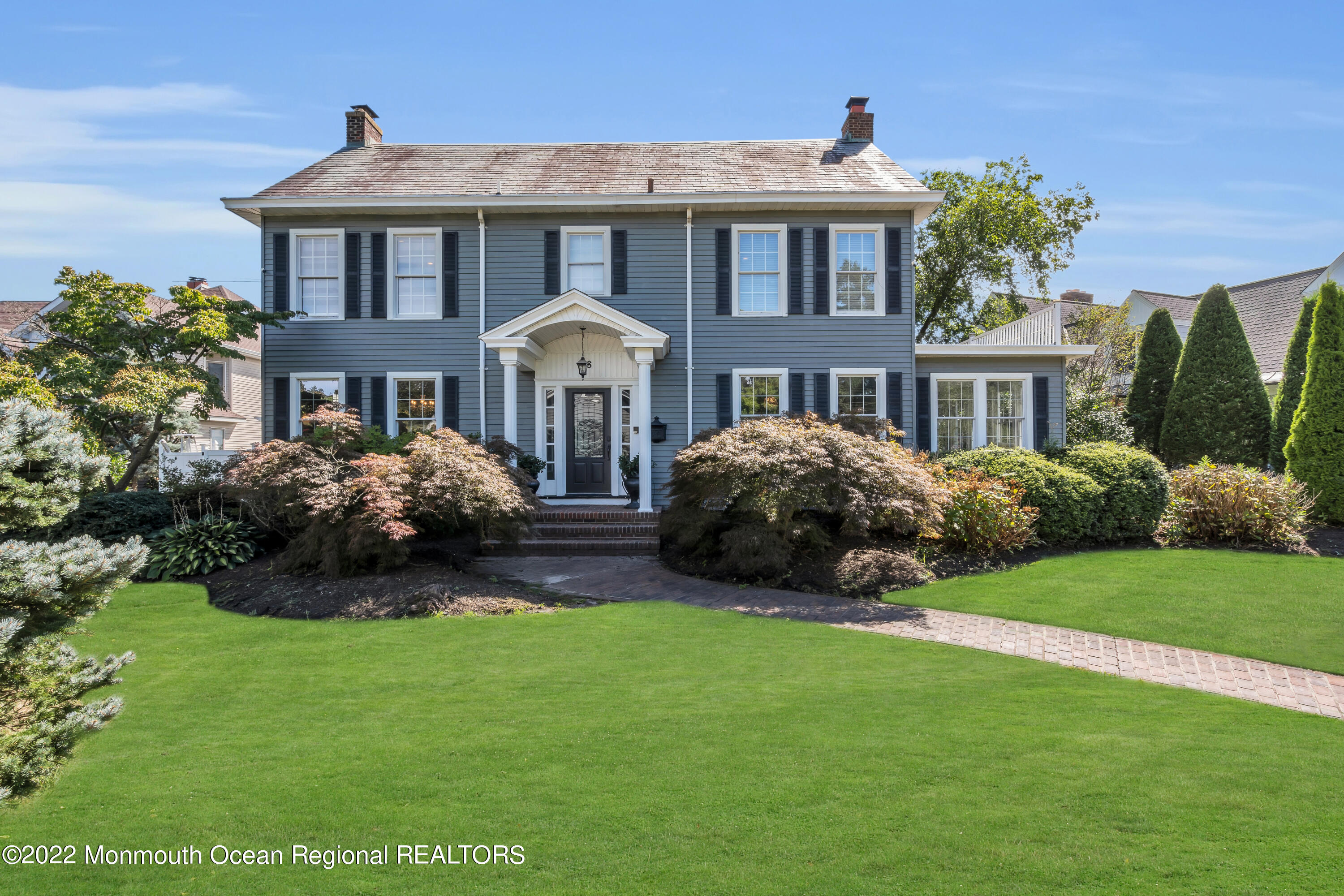 18 Brooks Road Toms River, NJ 08753 - Photo 4 of 53 a front view of a house with a garden