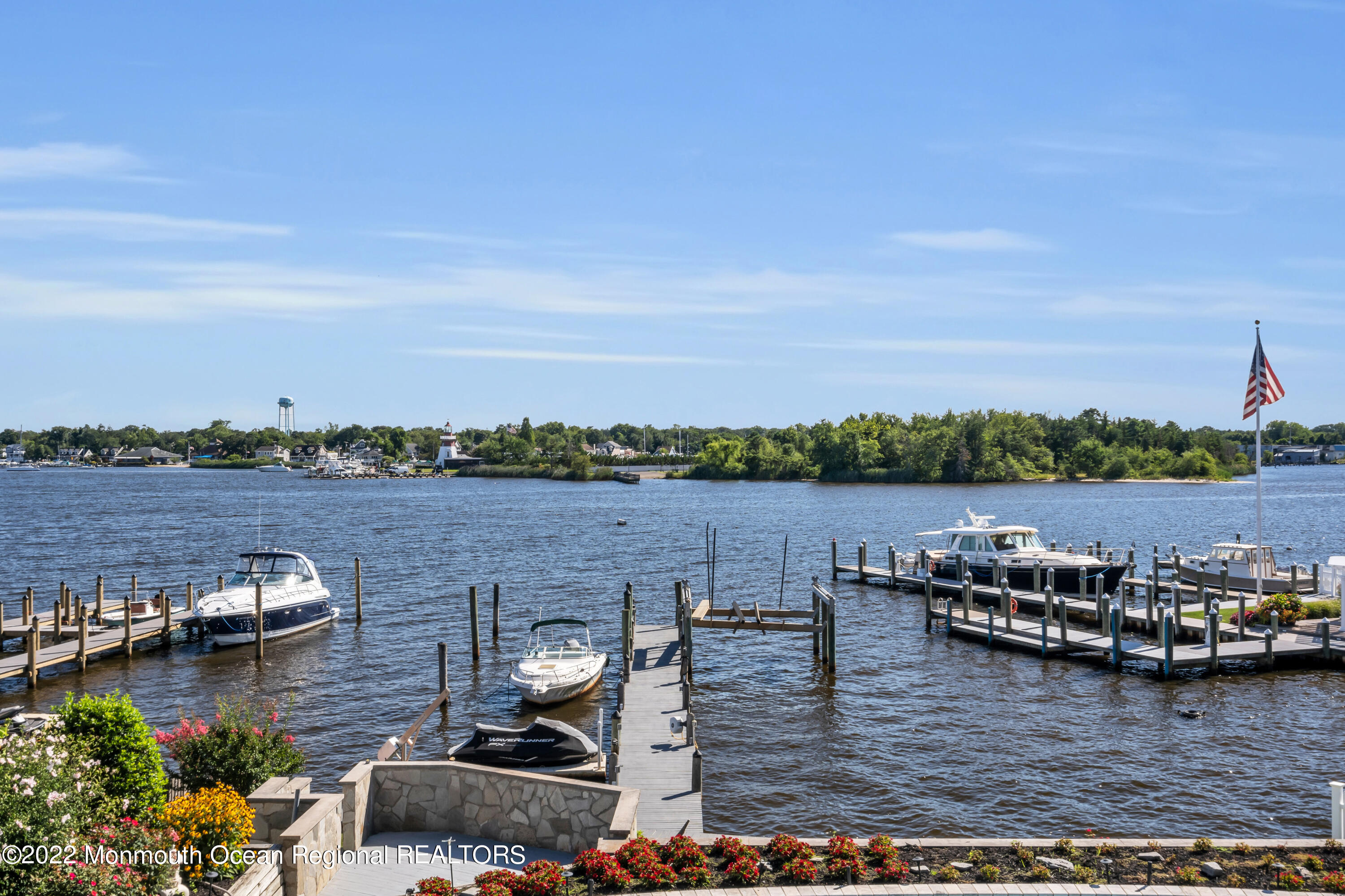 18 Brooks Road Toms River, NJ 08753 - Photo 44 of 53 a view of a lake with houses in back