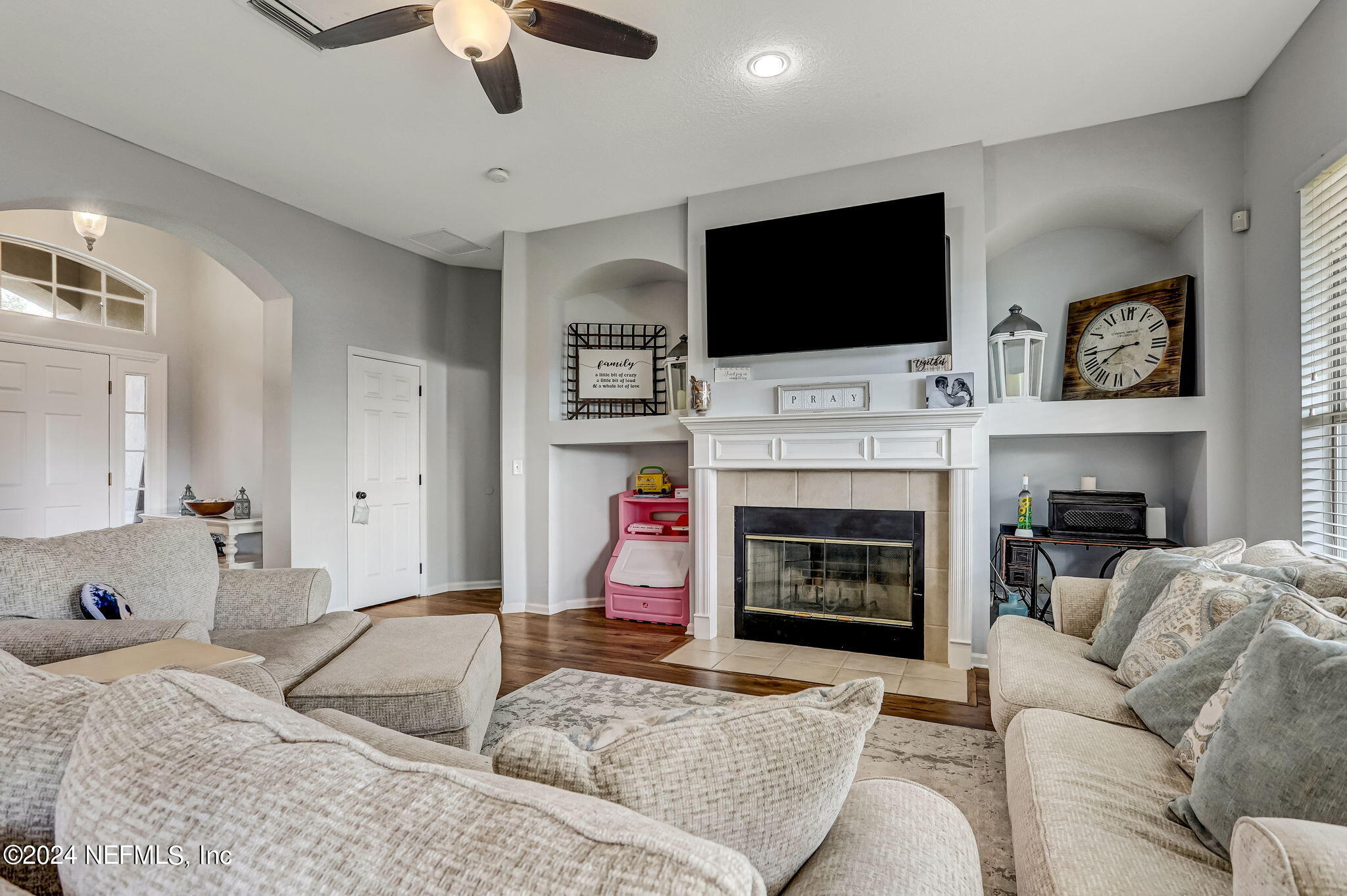 261 Porta Rosa Circle St. Augustine, FL 32092 - Photo 12 of 81 a living room with furniture fireplace and flat screen tv