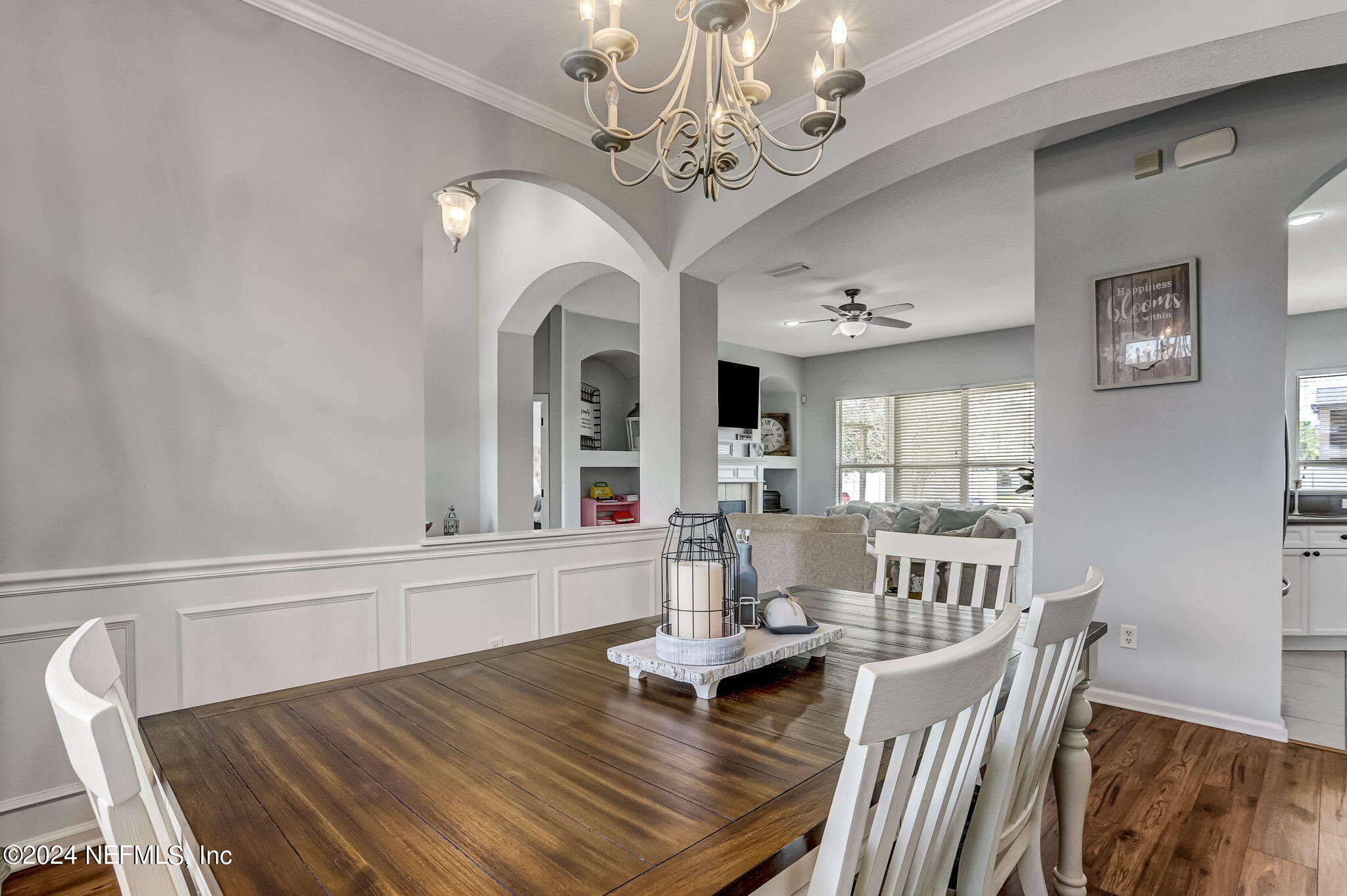 261 Porta Rosa Circle St. Augustine, FL 32092 - Photo 15 of 81 a view of a dining room with furniture a chandelier and wooden floor
