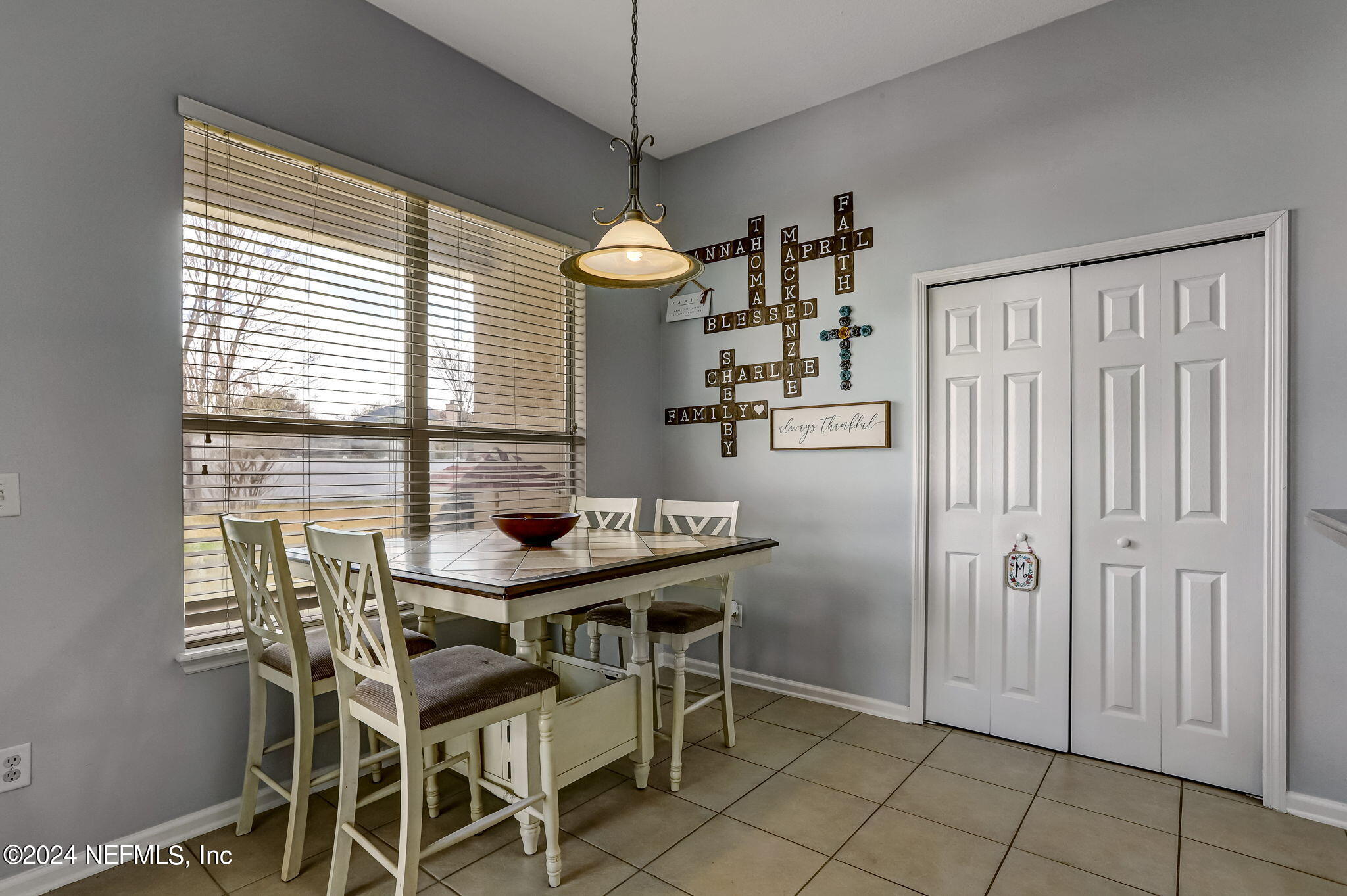 261 Porta Rosa Circle St. Augustine, FL 32092 - Photo 23 of 81 a view of a dining room with furniture window and wooden floor