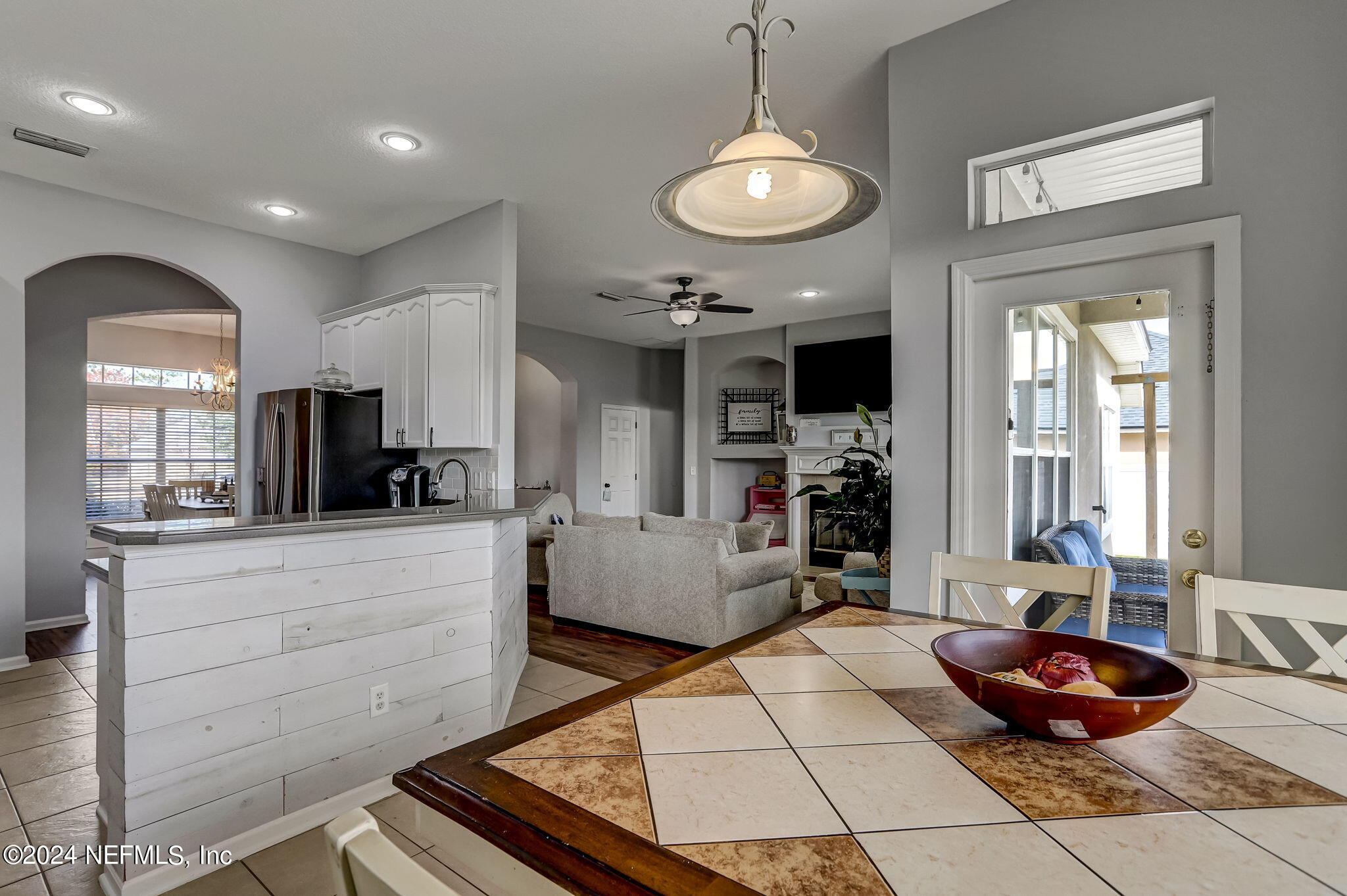 261 Porta Rosa Circle St. Augustine, FL 32092 - Photo 24 of 81 a living room with furniture and a wooden floor