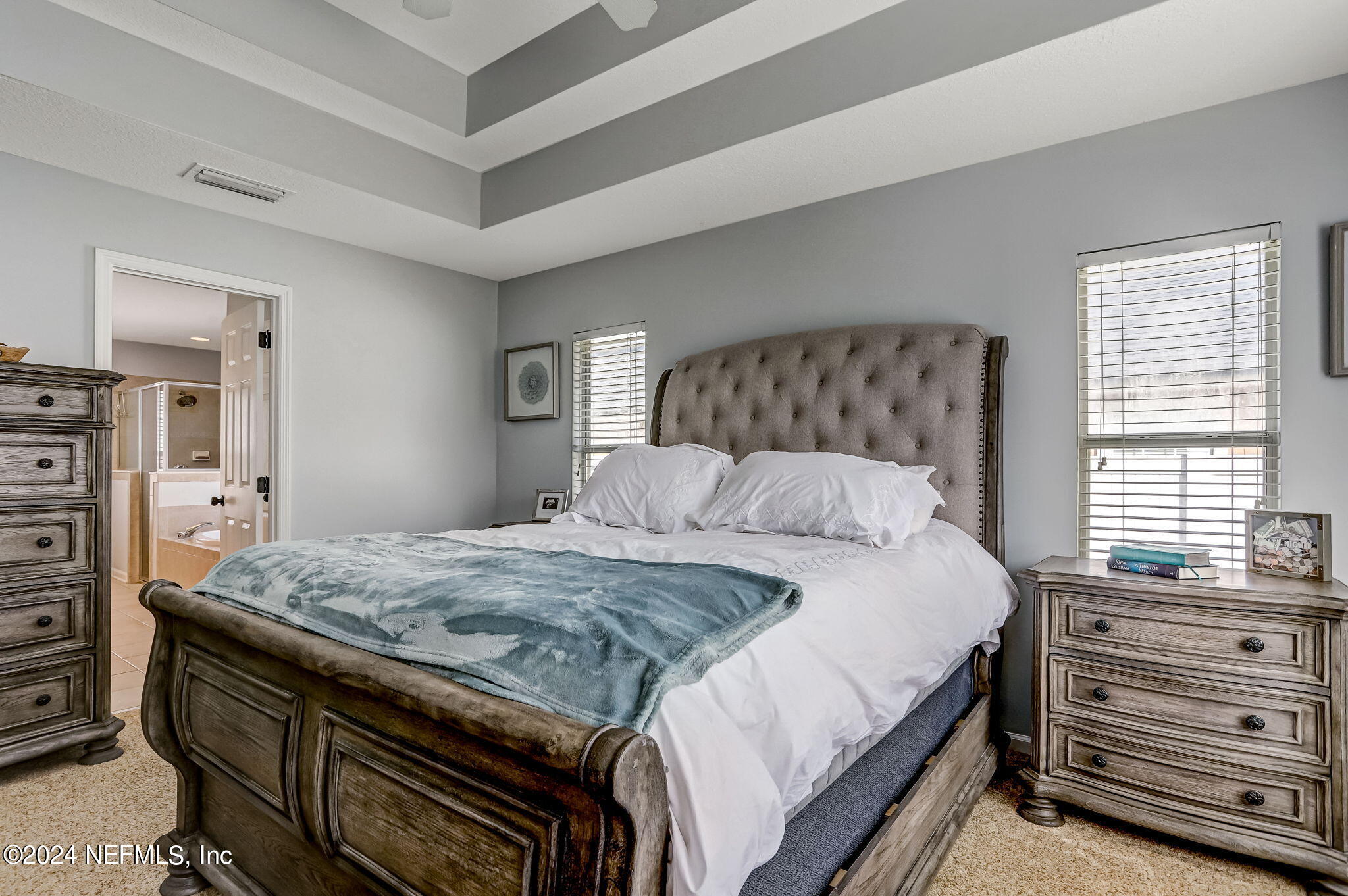 261 Porta Rosa Circle St. Augustine, FL 32092 - Photo 27 of 81 a bedroom with a bed and a dresser