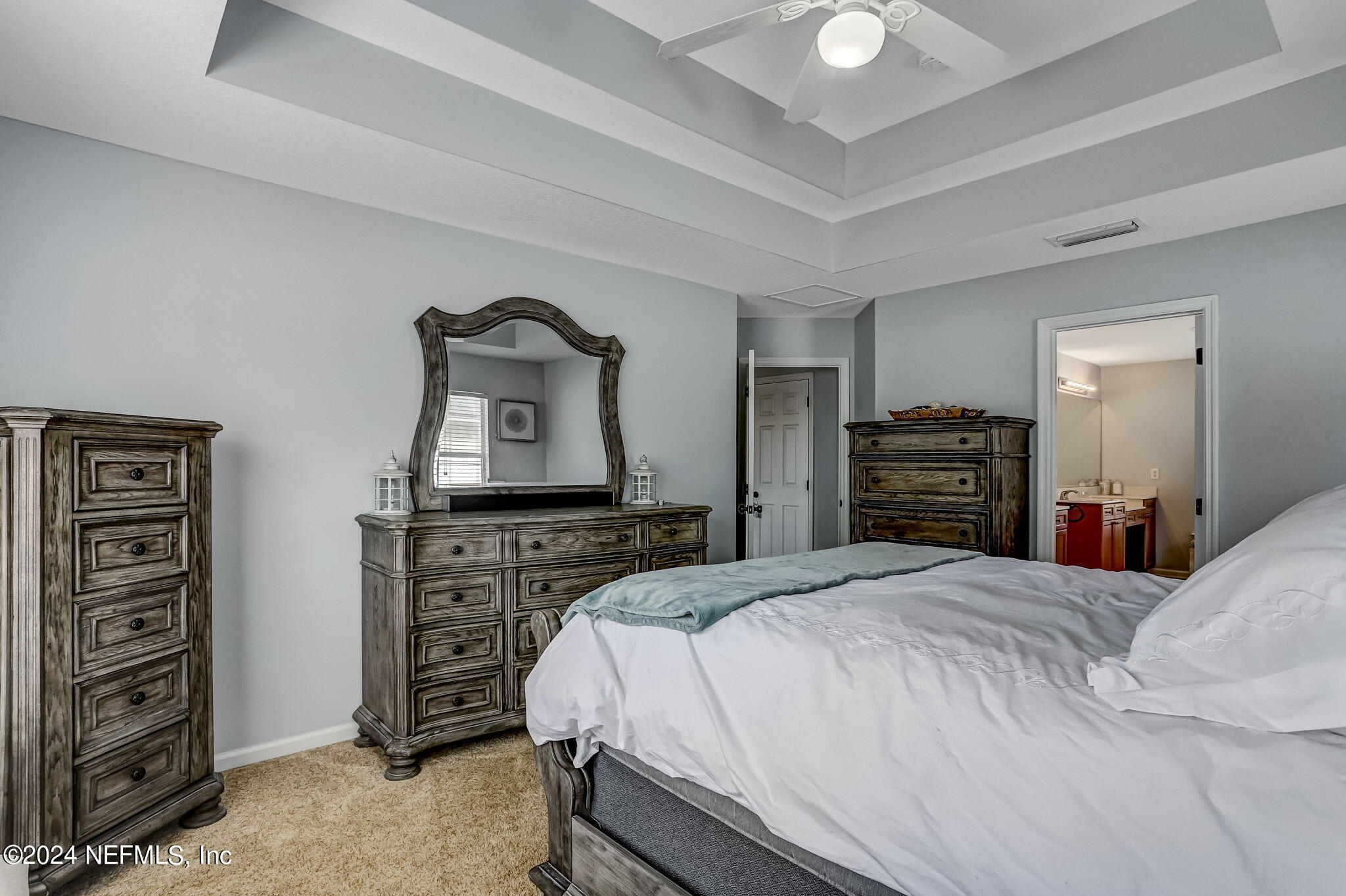 261 Porta Rosa Circle St. Augustine, FL 32092 - Photo 28 of 81 a bedroom with a bed and dresser