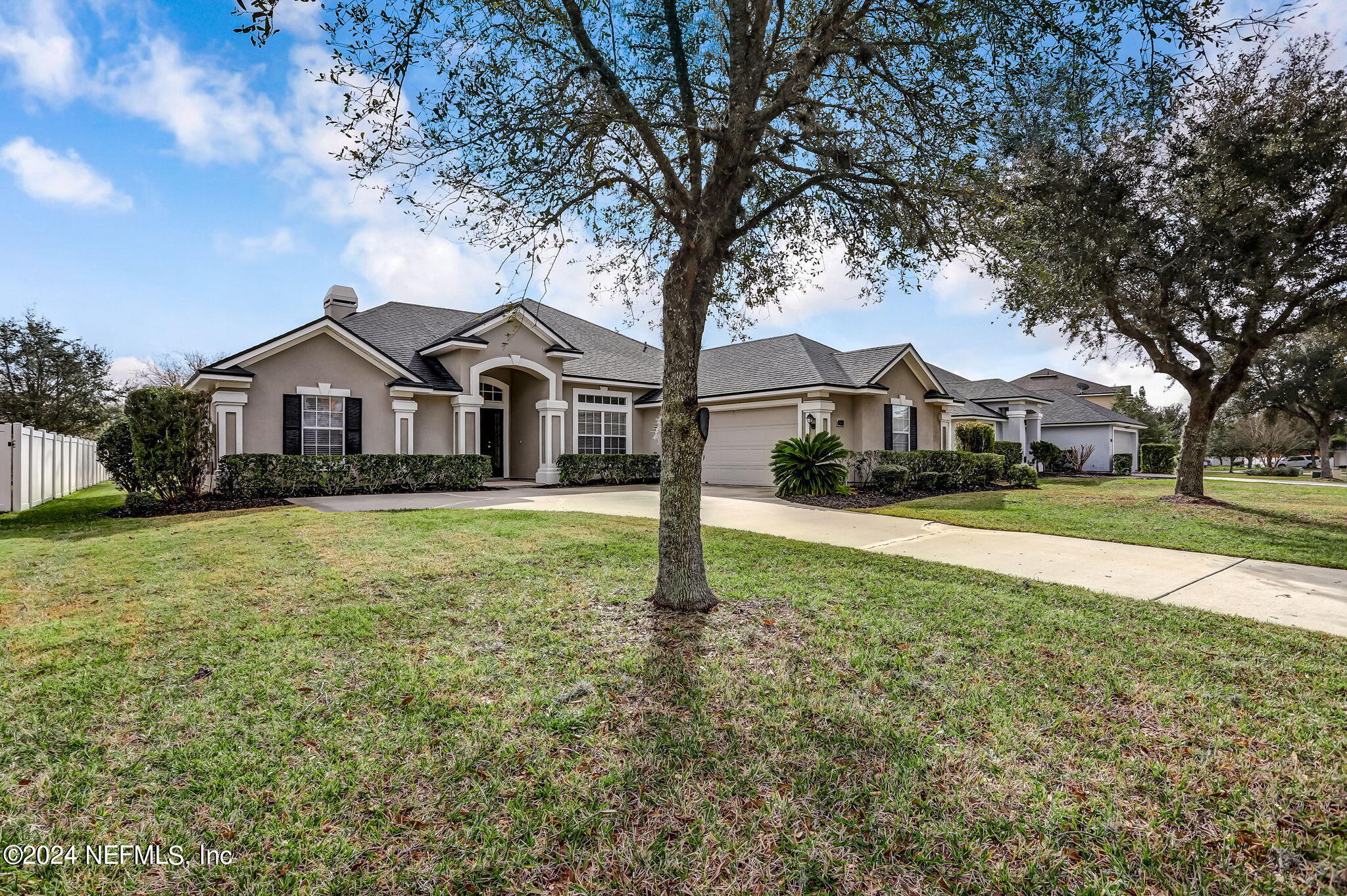 261 Porta Rosa Circle St. Augustine, FL 32092 - Photo 3 of 81 a front view of a house with a yard