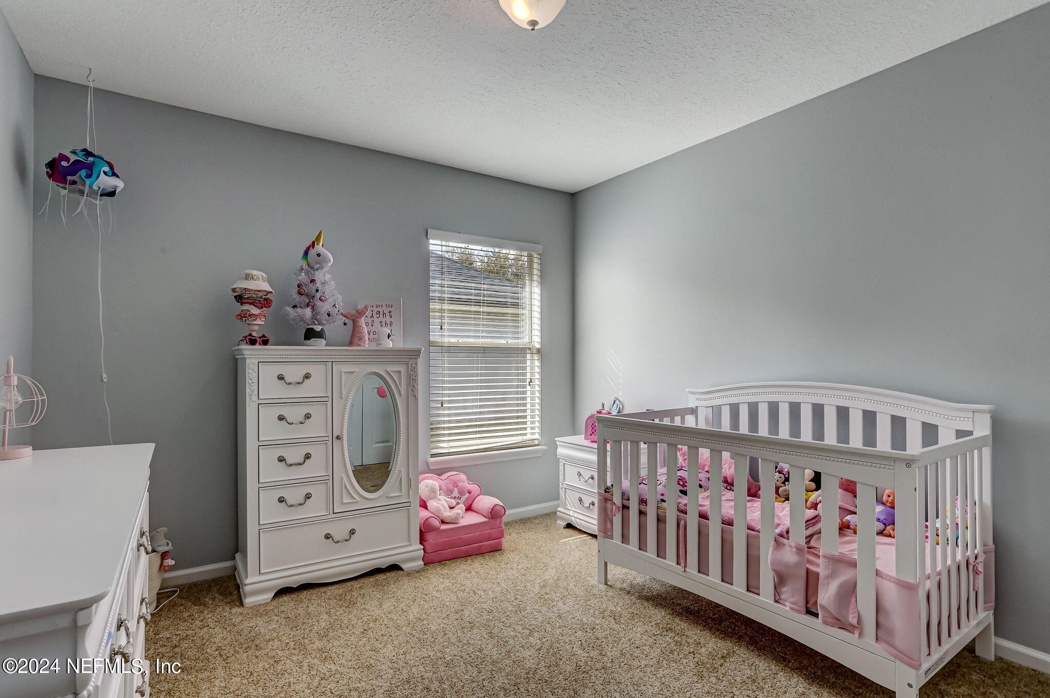 261 Porta Rosa Circle St. Augustine, FL 32092 - Photo 32 of 81 a bedroom with furniture and a window