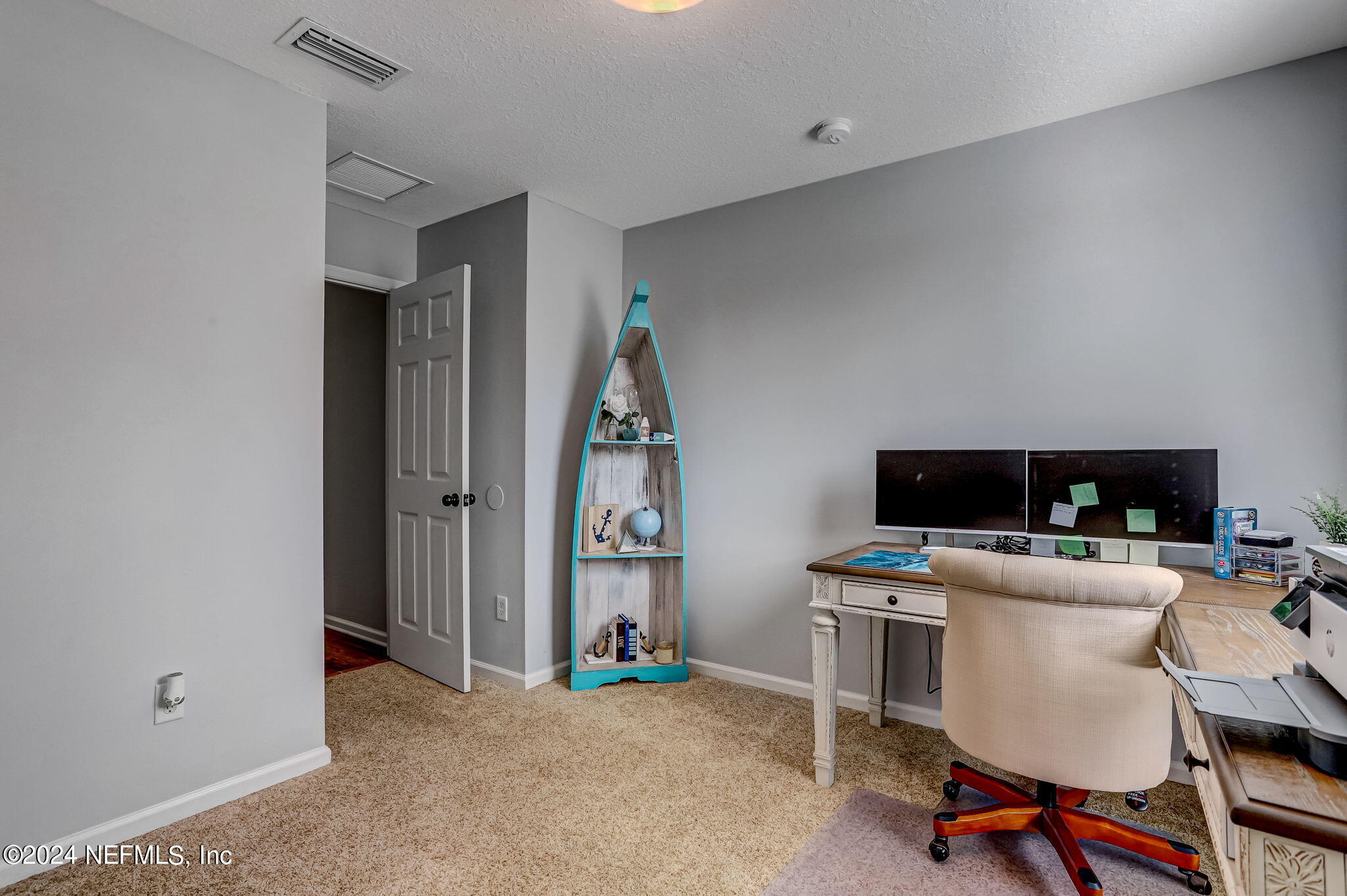 261 Porta Rosa Circle St. Augustine, FL 32092 - Photo 37 of 81 a view of a workspace with furniture and a window