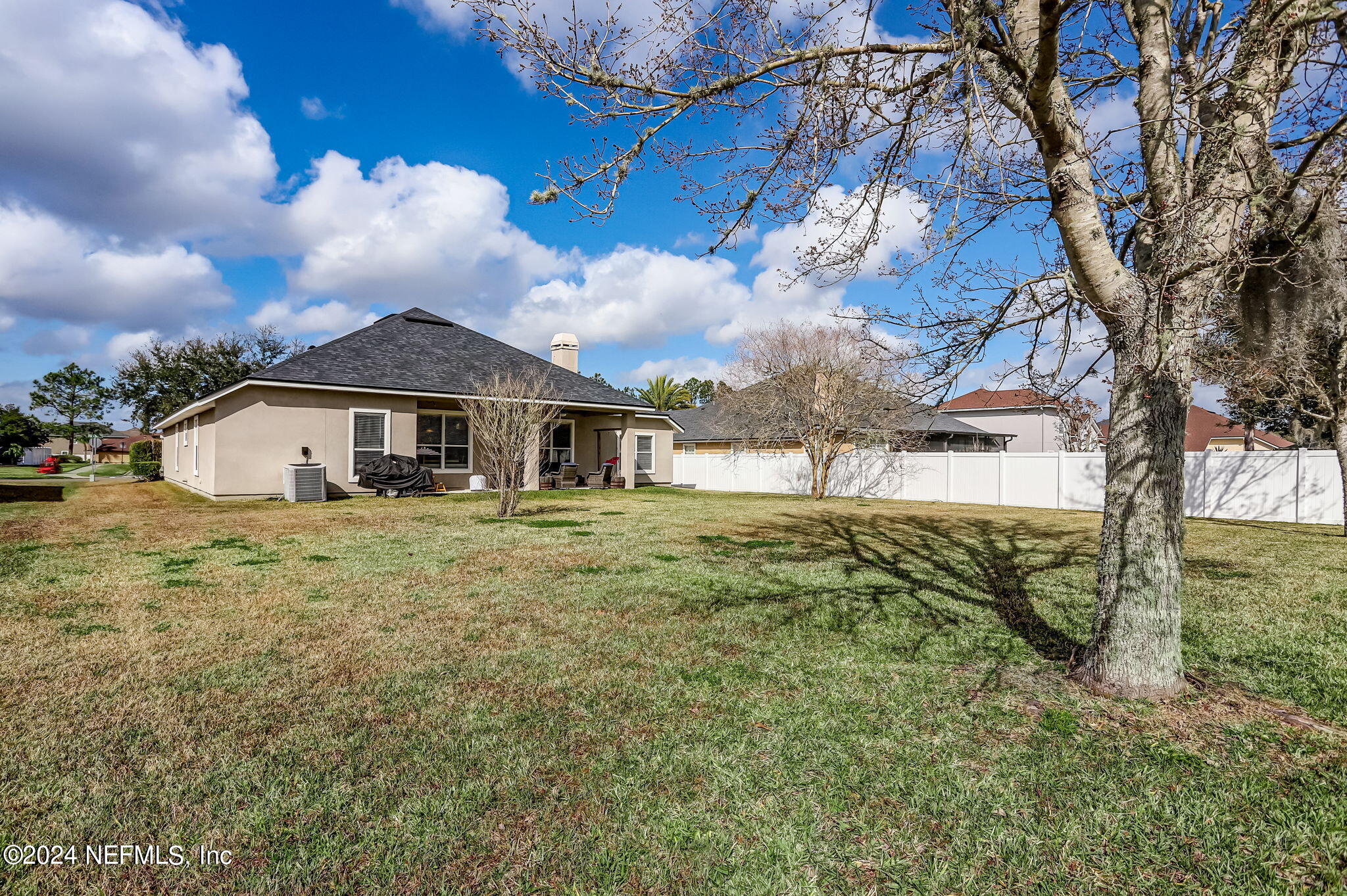 261 Porta Rosa Circle St. Augustine, FL 32092 - Photo 44 of 81 a front view of a house with garden
