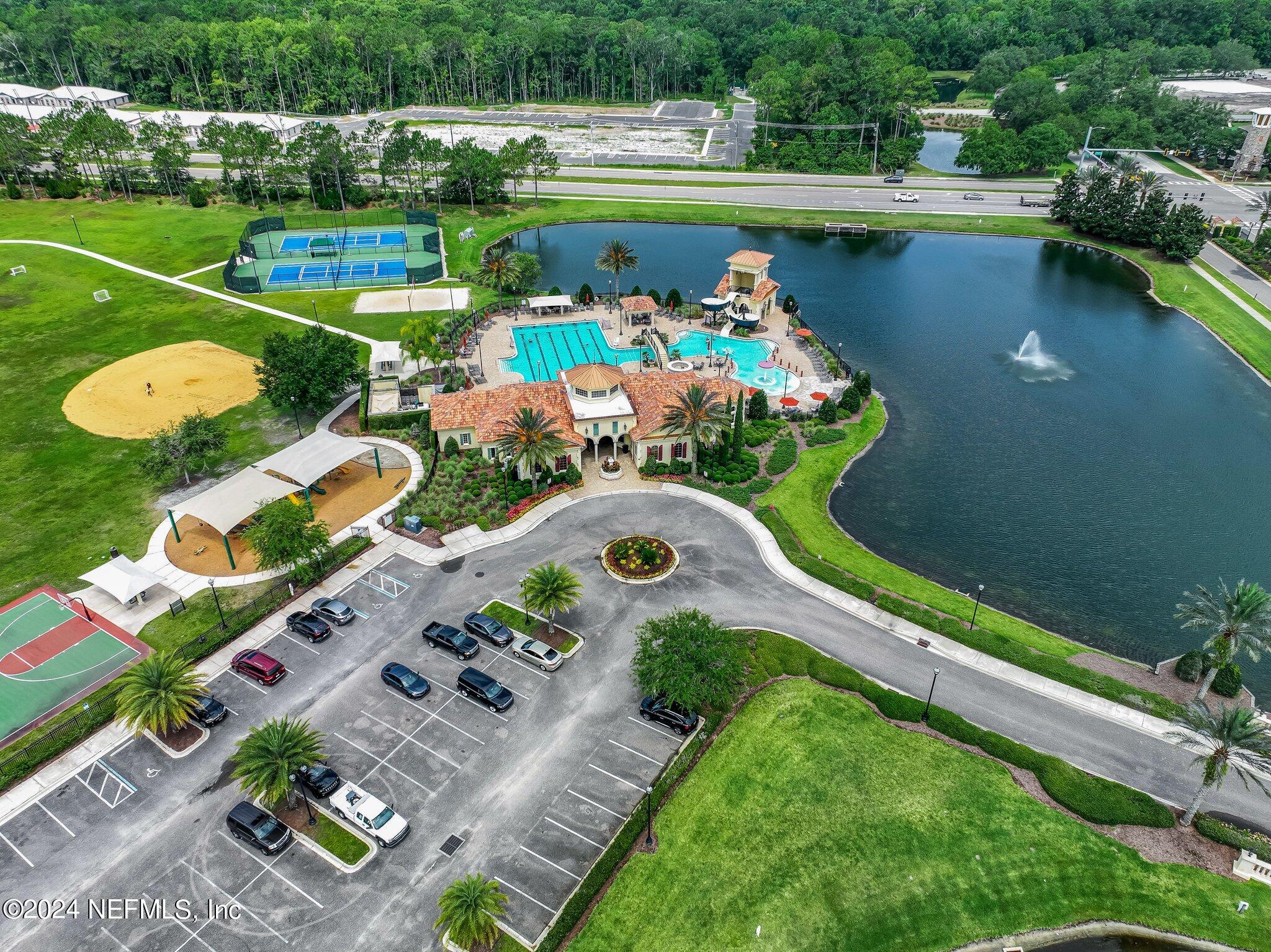 261 Porta Rosa Circle St. Augustine, FL 32092 - Photo 60 of 81 an aerial view of a swimming pool a yard and outdoor seating