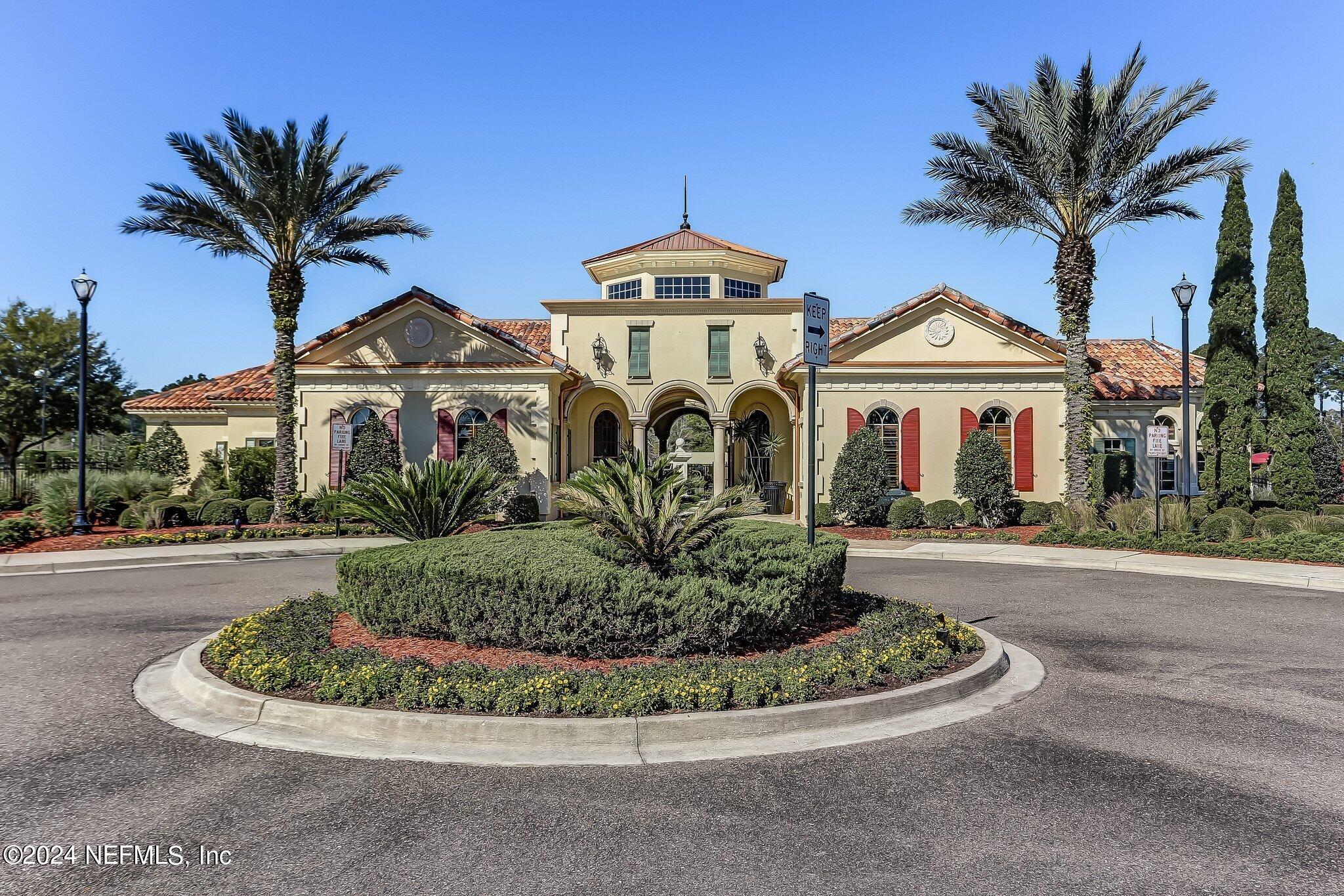 261 Porta Rosa Circle St. Augustine, FL 32092 - Photo 64 of 81 a front view of a house with a garden