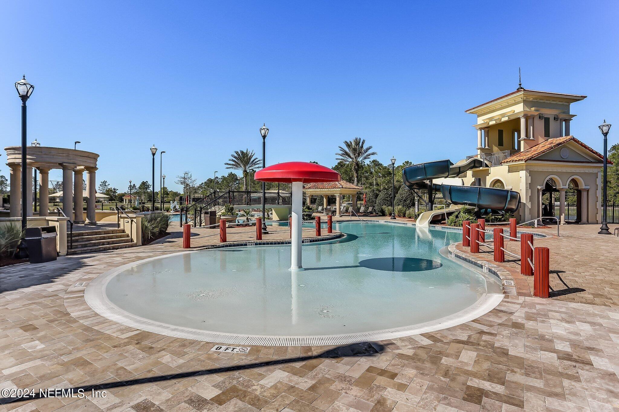 261 Porta Rosa Circle St. Augustine, FL 32092 - Photo 69 of 81 a view of a swimming pool with a patio