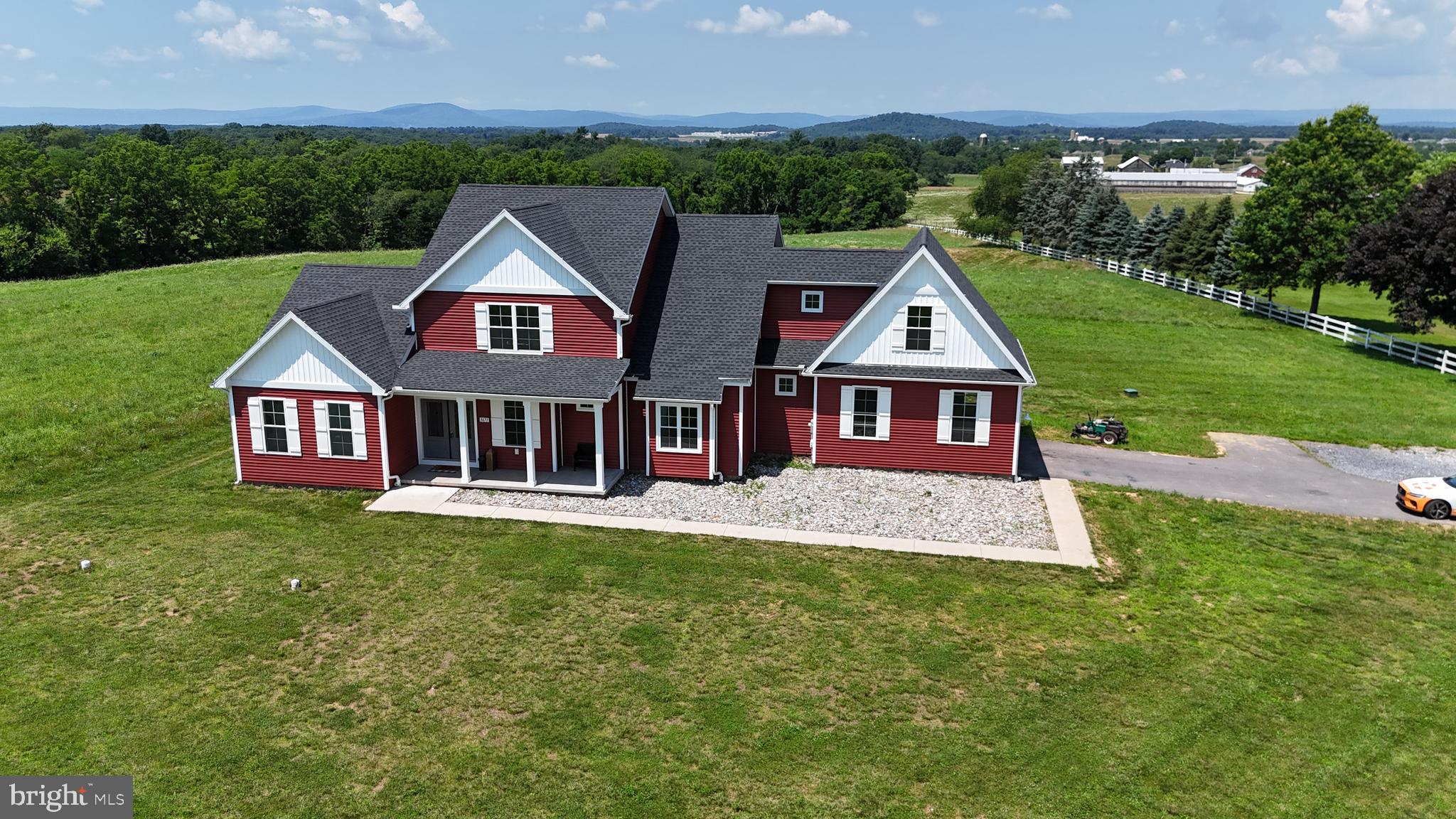 3671 Taneytown Road Gettysburg, PA 17325 - Photo 1 of 57 a aerial view of a house next to a big yard and large trees