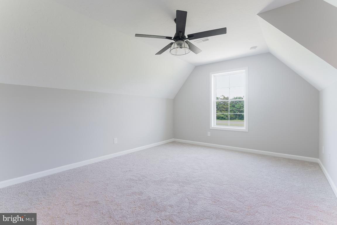3671 Taneytown Road Gettysburg, PA 17325 - Photo 33 of 57 an empty room with a window and a fan