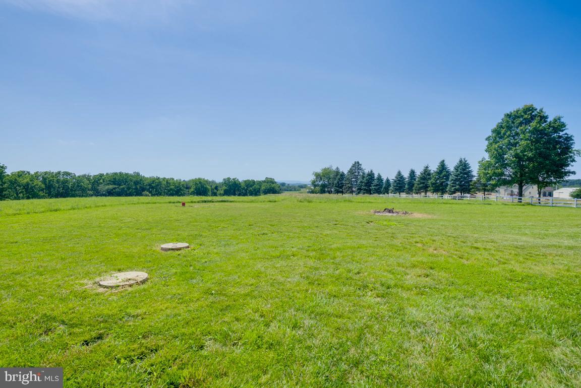 3671 Taneytown Road Gettysburg, PA 17325 - Photo 35 of 57 a view of a lake with houses in the background