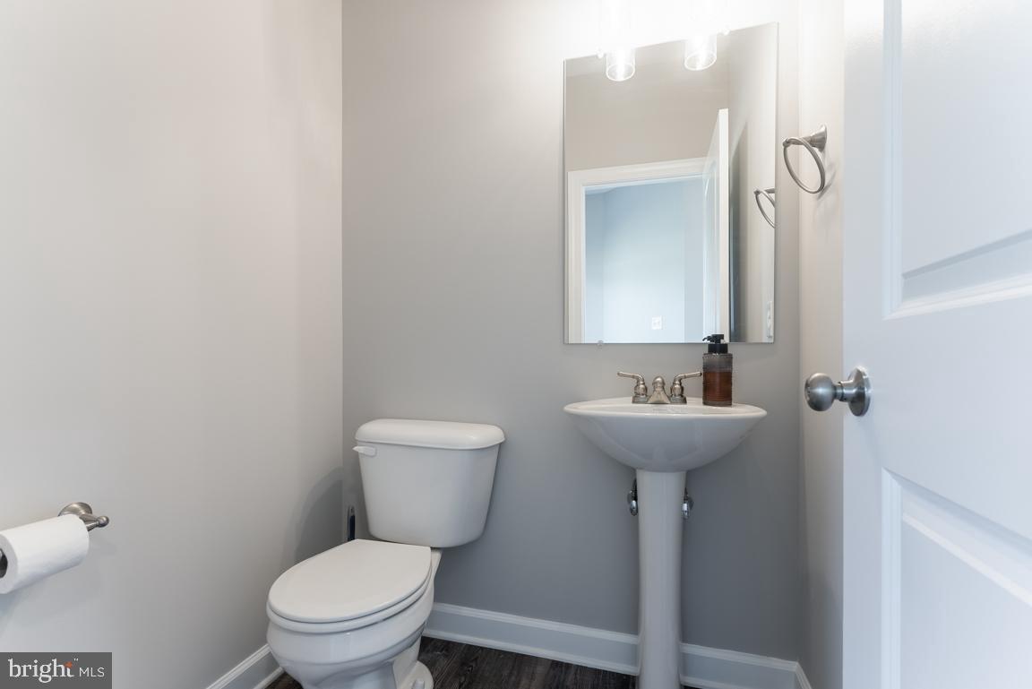 3671 Taneytown Road Gettysburg, PA 17325 - Photo 9 of 57 a bathroom with a toilet sink and mirror