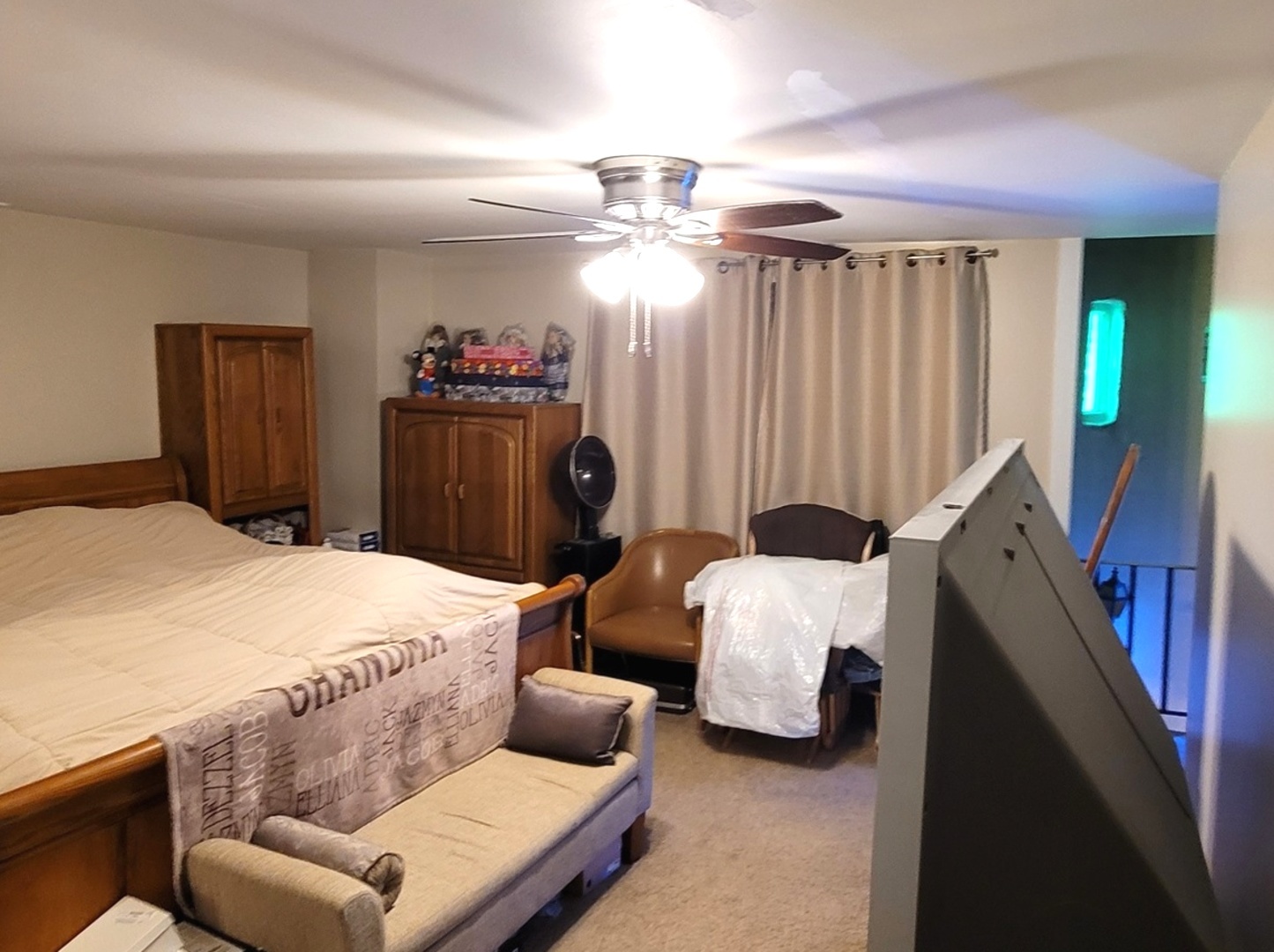 7432 West Gregory Street Chicago, IL 60656 - Photo 23 of 55 a bedroom with a bed and a chandelier