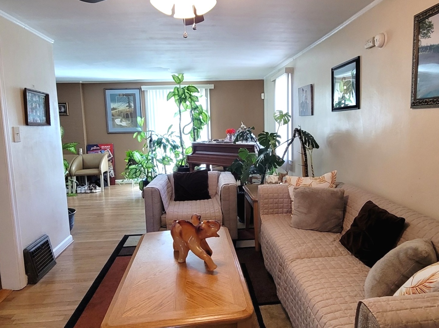 7432 West Gregory Street Chicago, IL 60656 - Photo 8 of 55 a living room with furniture and a wooden floor