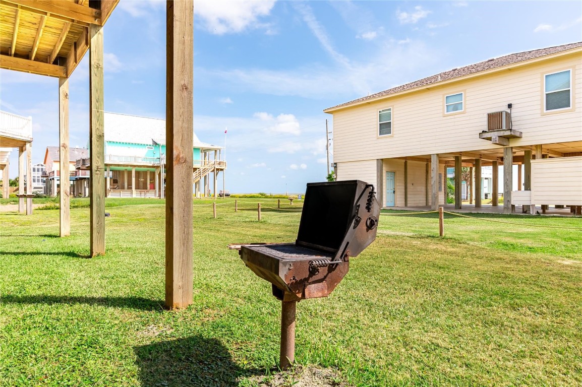 2576 Whitecap Crystal Beach, TX 77650 - Photo 45 of 49 a view of a garden with a lounge chair