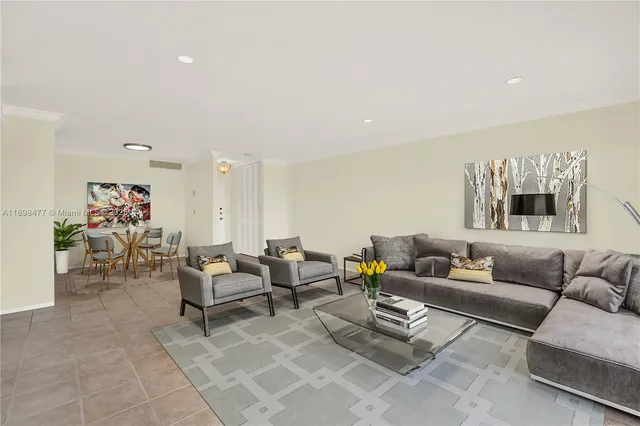 a living room with furniture and a couch