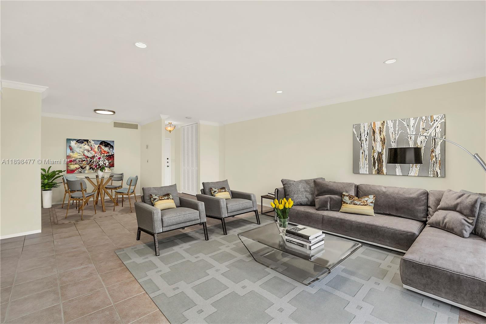 2451 Brickell Avenue, Unit 6N Miami, FL 33129 - Photo 12 of 43 a living room with furniture and a couch