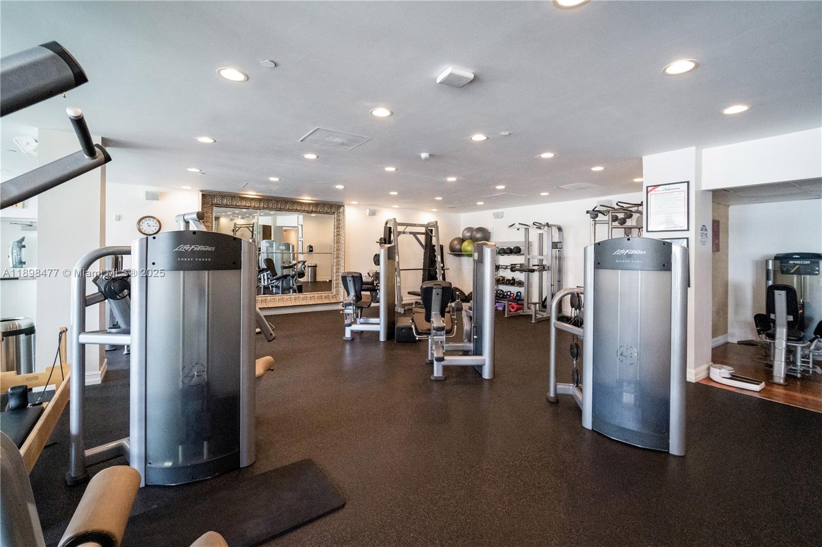 2451 Brickell Avenue, Unit 6N Miami, FL 33129 - Photo 38 of 43 a view of a room with gym equipment
