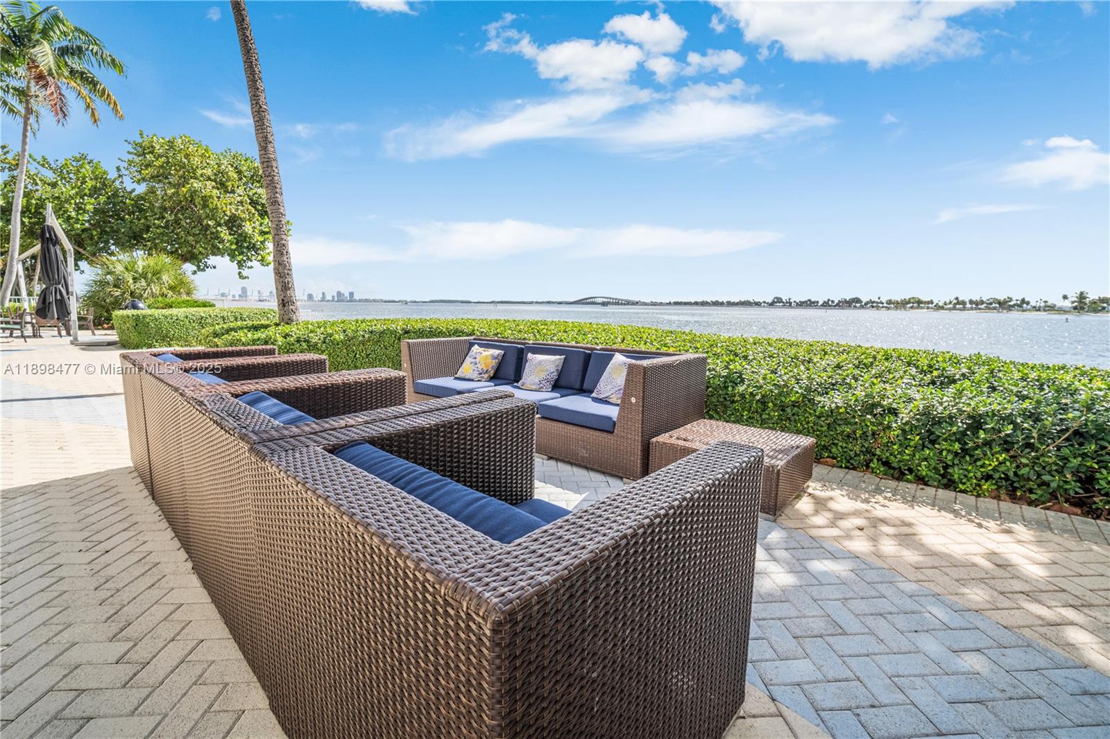2451 Brickell Avenue, Unit 6N Miami, FL 33129 - Photo 40 of 43 a view of swimming pool with outdoor seating and garden