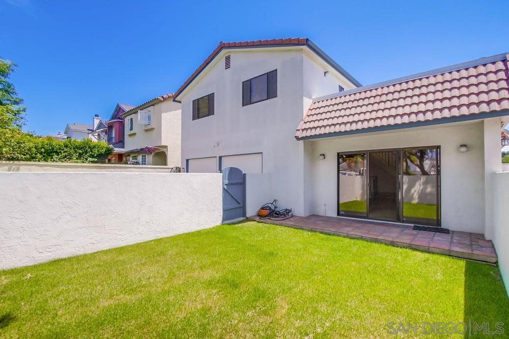 349 G Coronado, CA 92118 - Photo 4 of 18 a front view of a house with a yard and porch