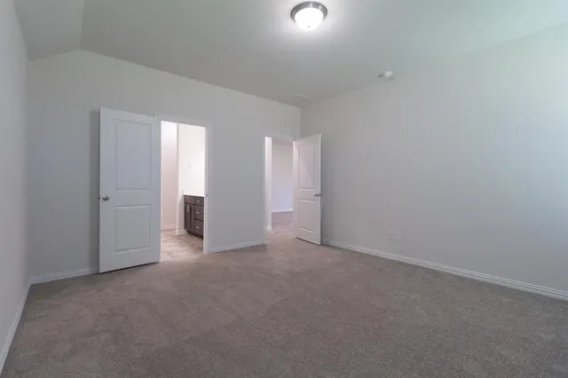 a bathroom with a sink double vanity and a mirror