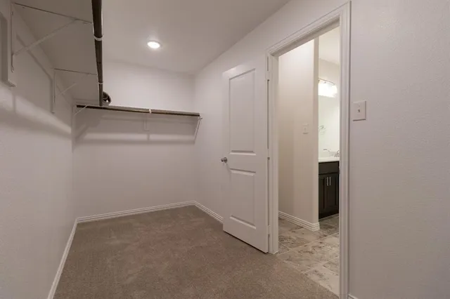 a bathroom with a double vanity sink a and mirror